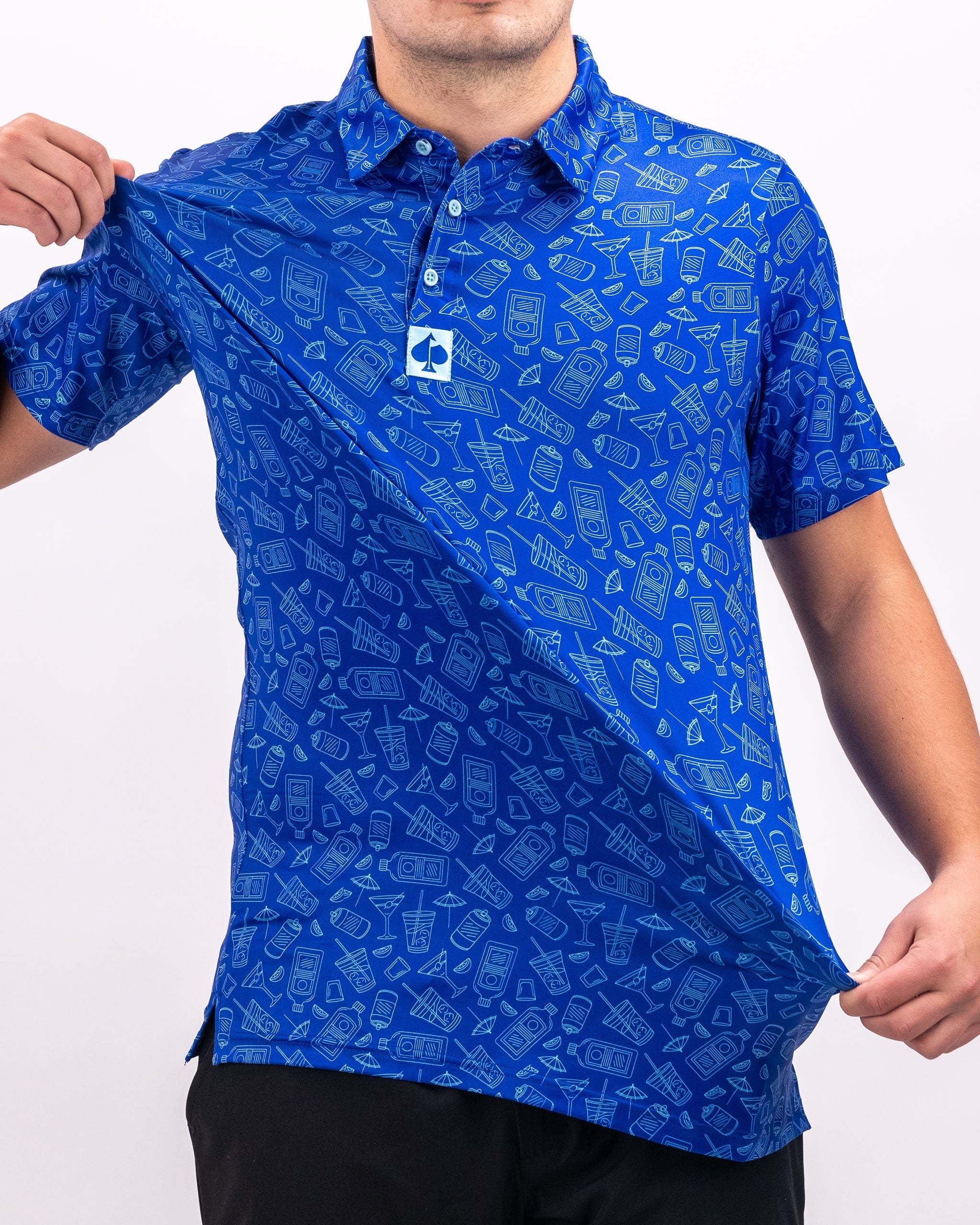 Bold blue golf polo shirt featuring a playful pattern of drinks and golf-themed icons, perfect for standout style on the course.