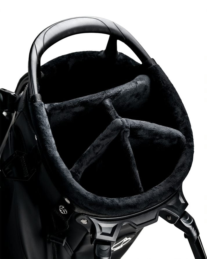 Top view of the Player Preferred Golf Bag in Obsidian, showcasing a plush, black interior with multiple club dividers.