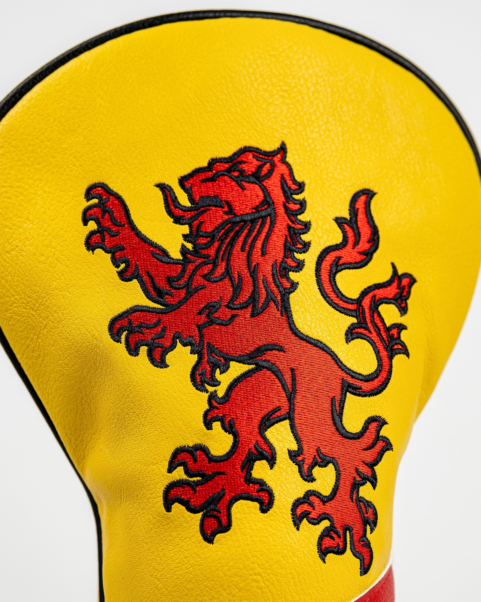 Scotland driver cover featuring a vibrant yellow background and a detailed red lion emblem. Perfect for golfers.