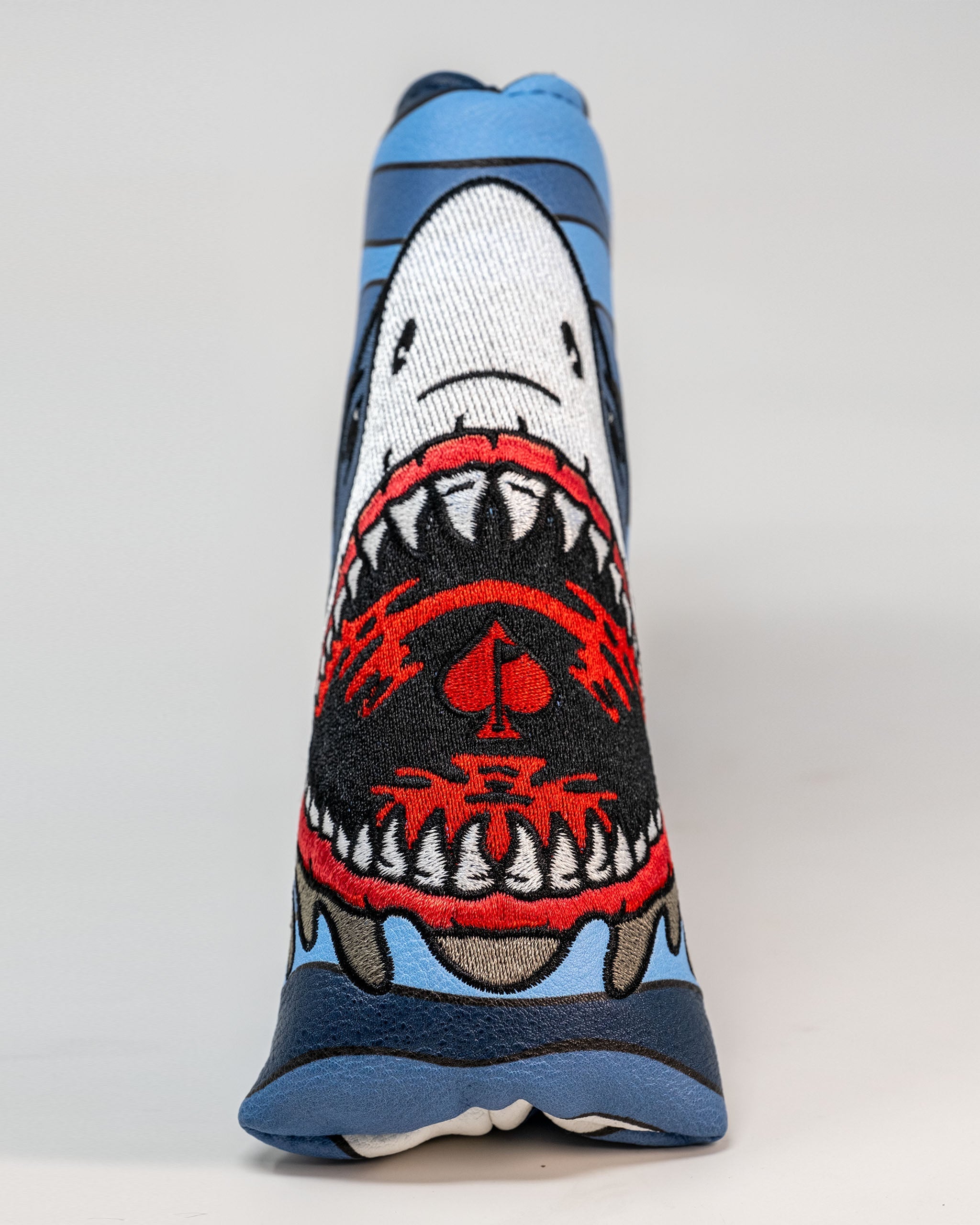 Bold Shark Attack blade putter cover featuring a fierce shark design with vibrant colors, perfect for standout golf style.