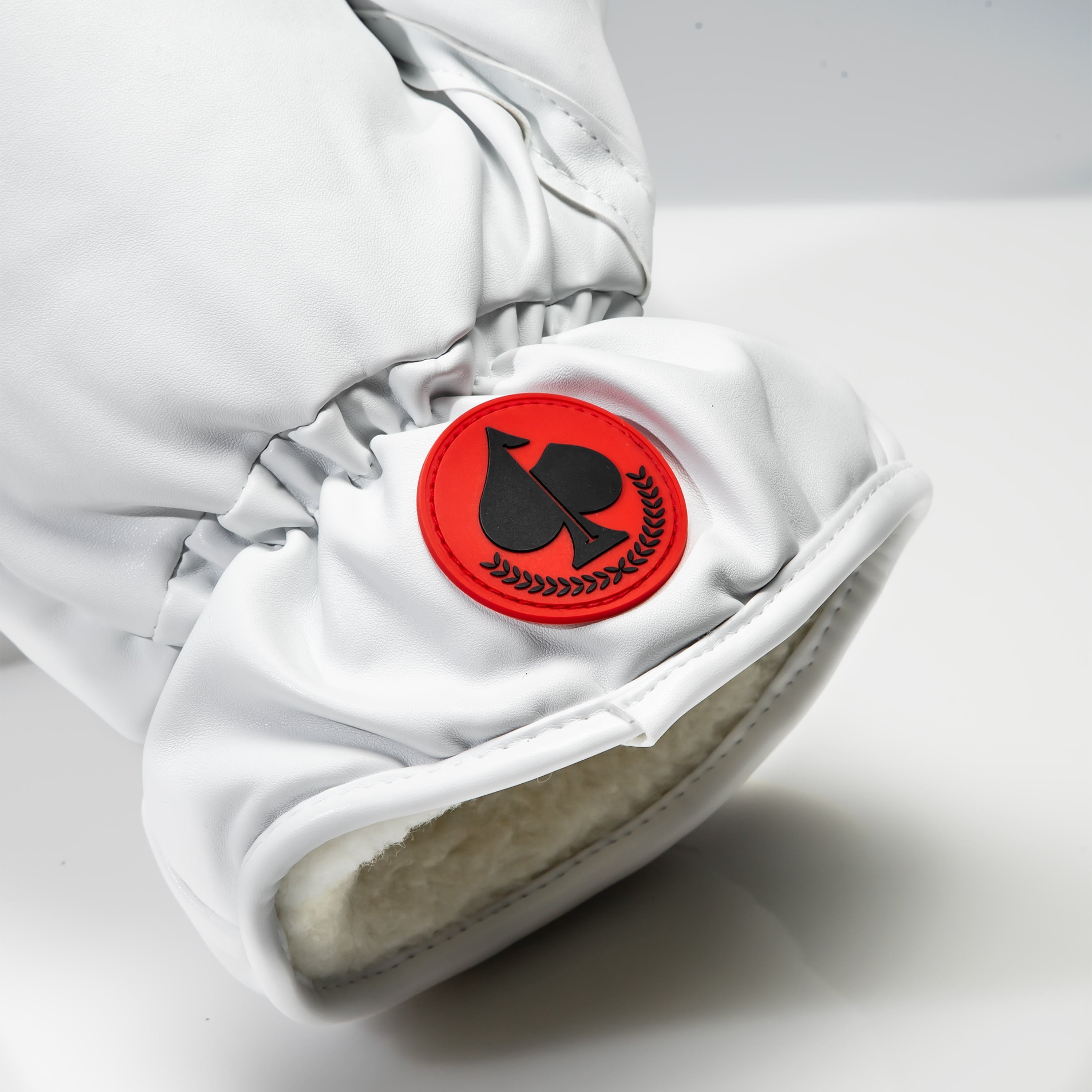 White boxing glove driver cover for golf clubs, featuring a sleek design and durable material.
