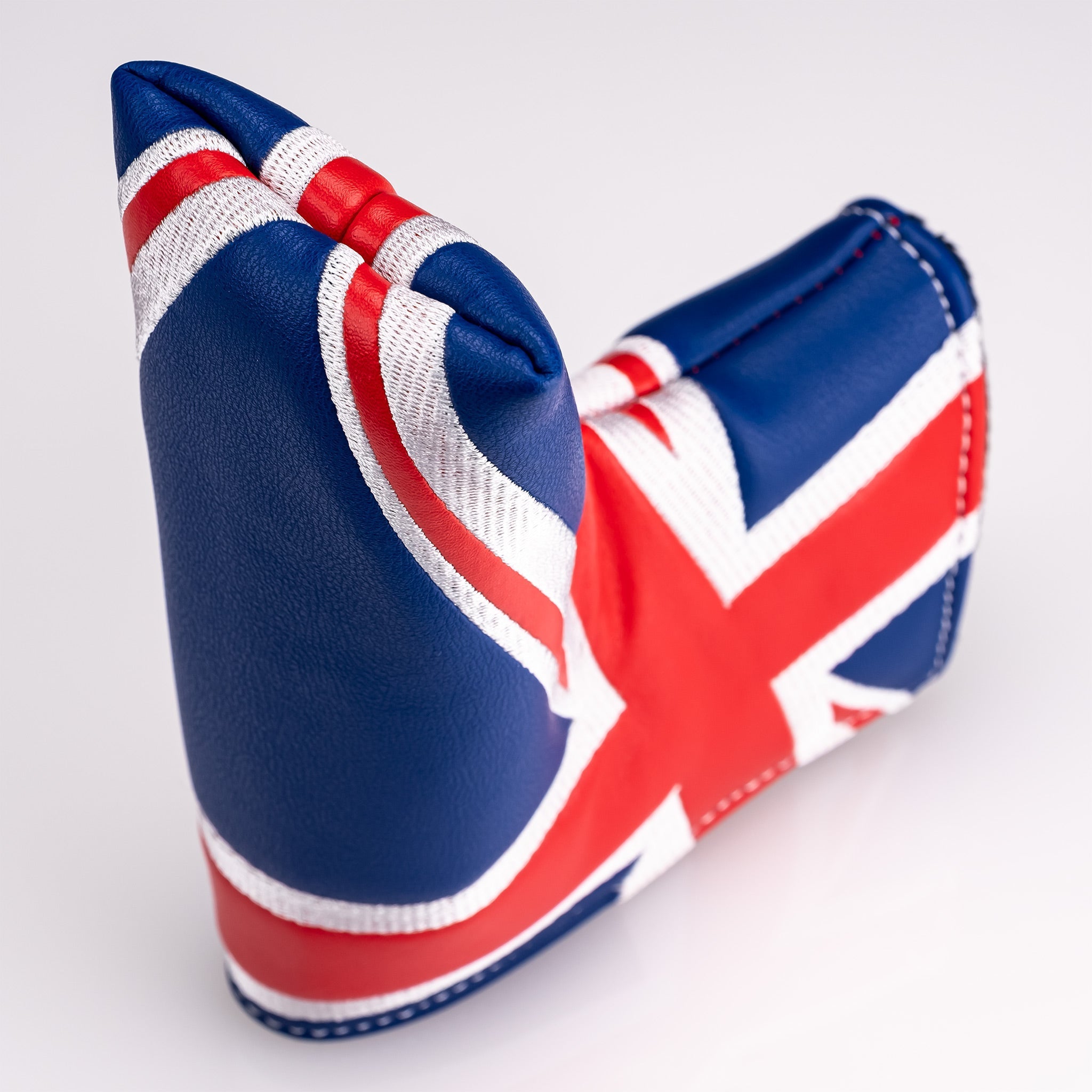 Bold blade putter cover featuring the Union Jack design in red, white, and blue, perfect for stylish golfers.