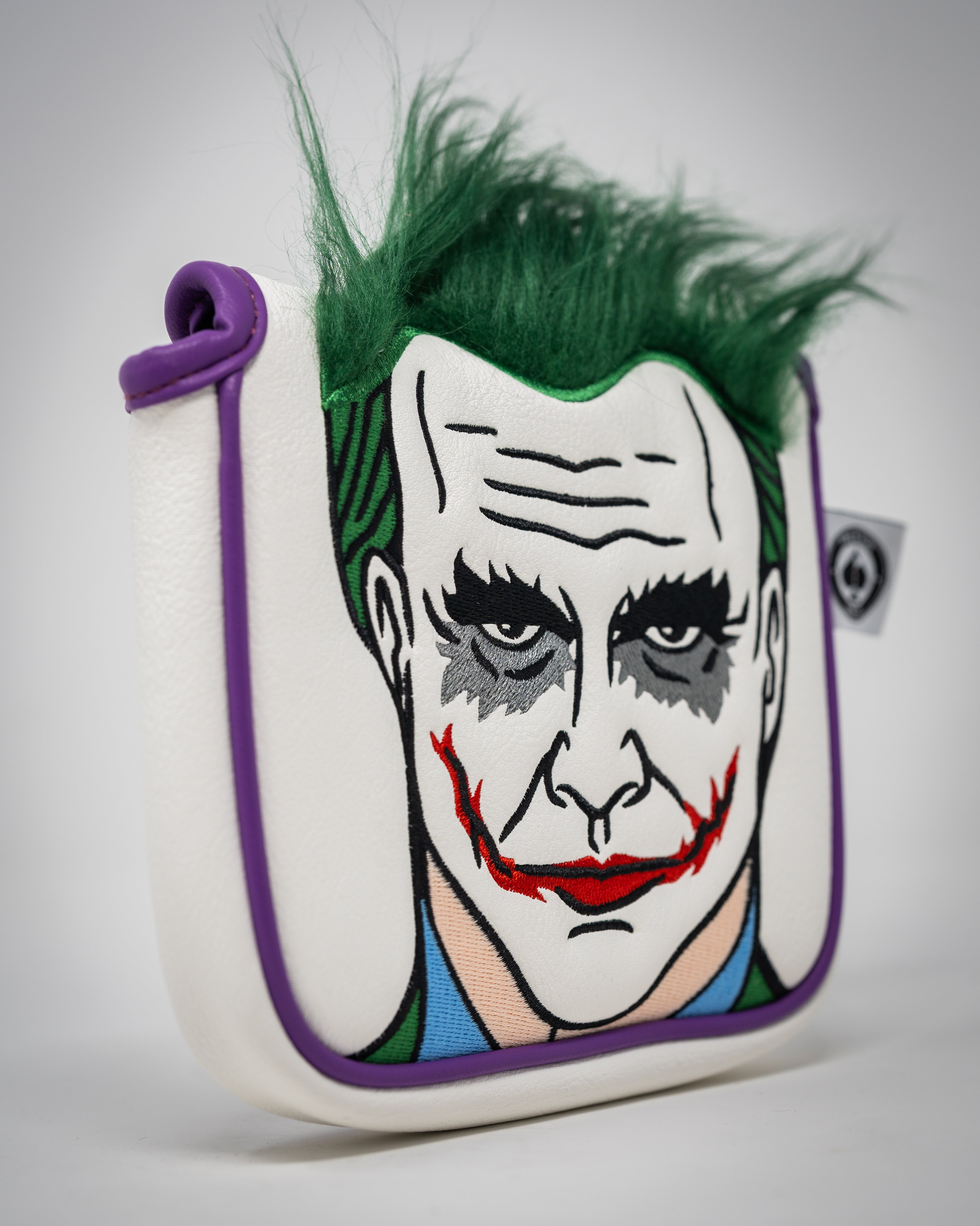 Joker-themed XL mallet putter cover featuring vibrant colors and a playful design.