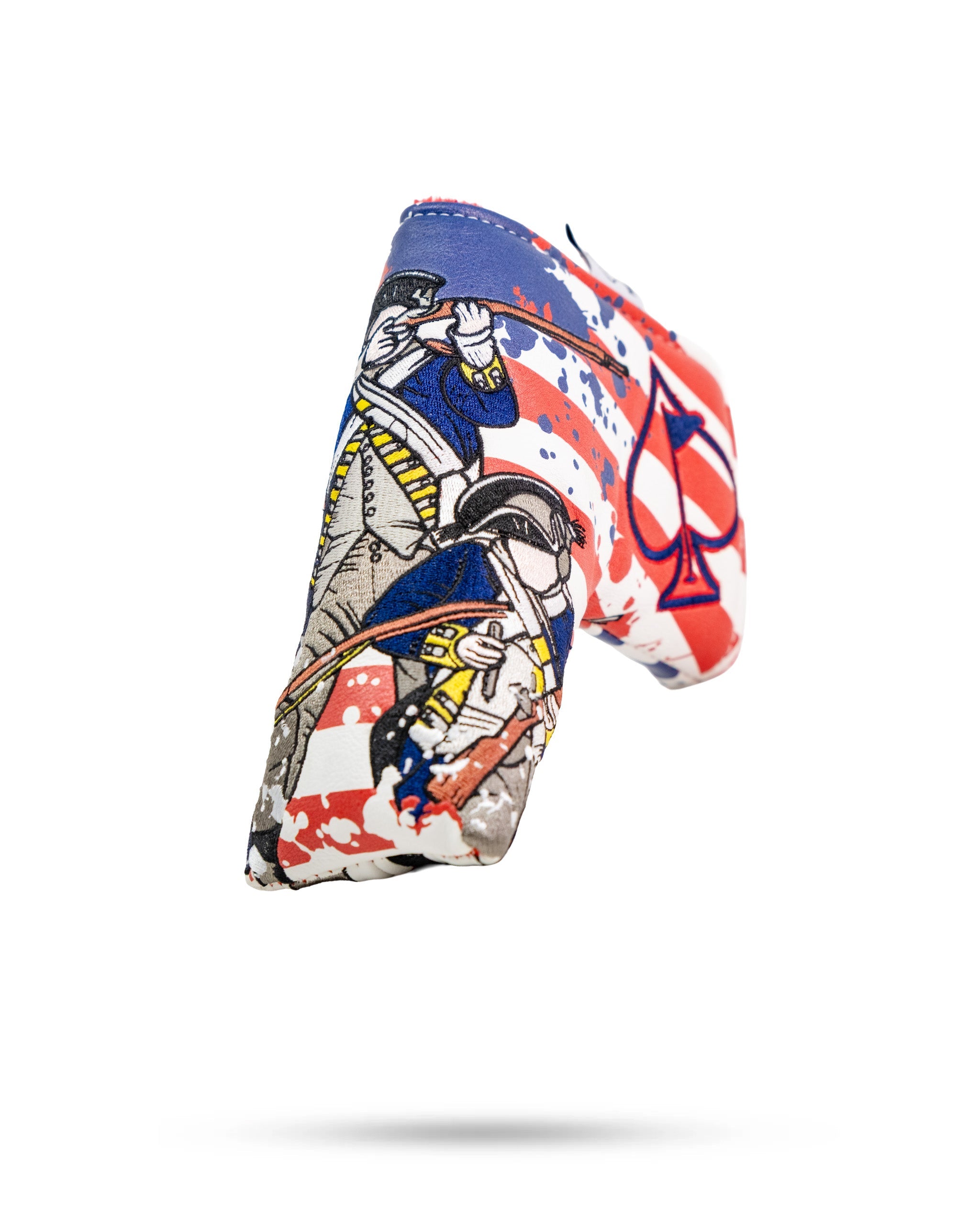 Colorful blade putter cover featuring pirate illustrations and a large spade symbol design.
