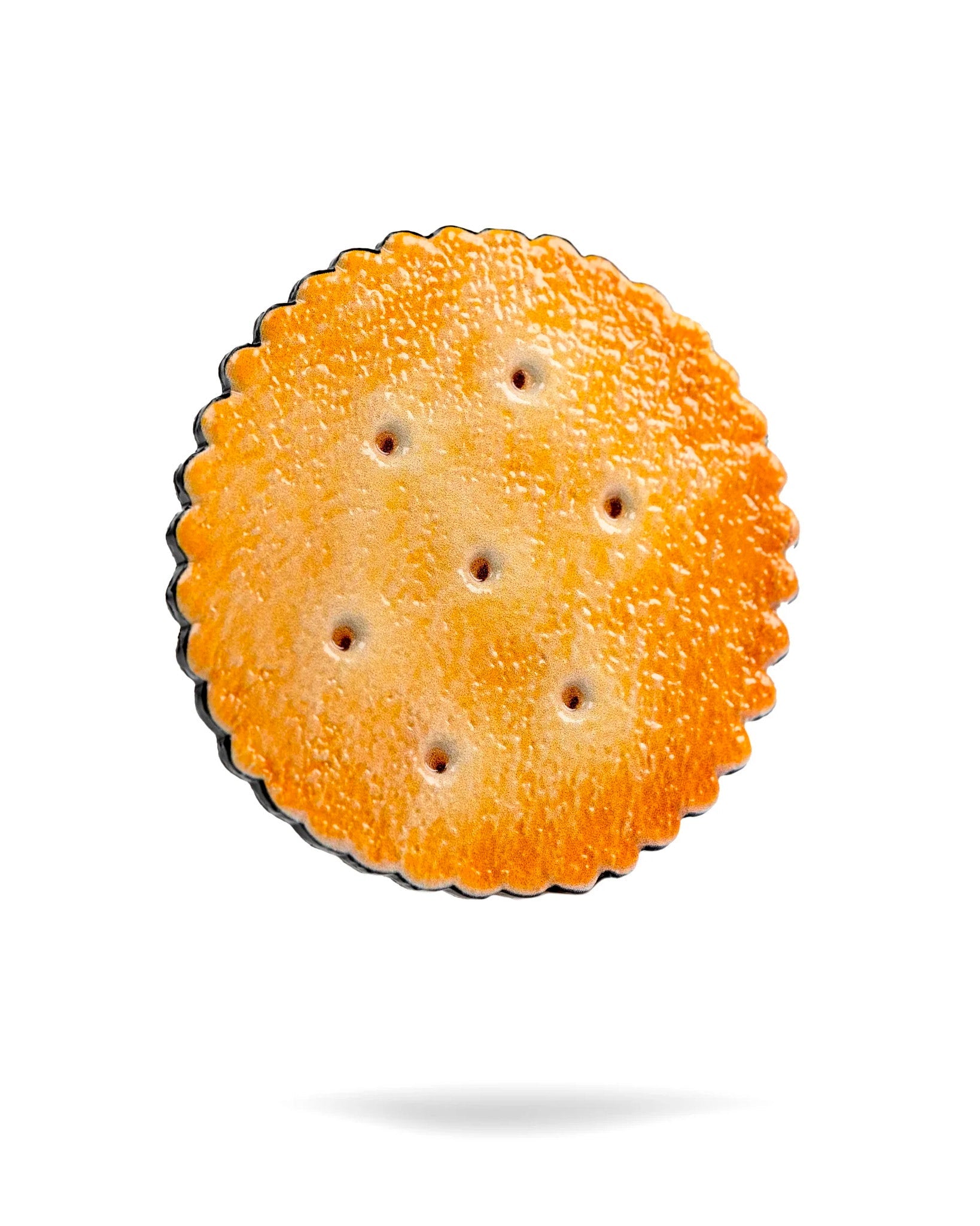 Gilmore Cracker Ball Marker featuring a unique design, crafted for golfers to easily mark their ball on the green.