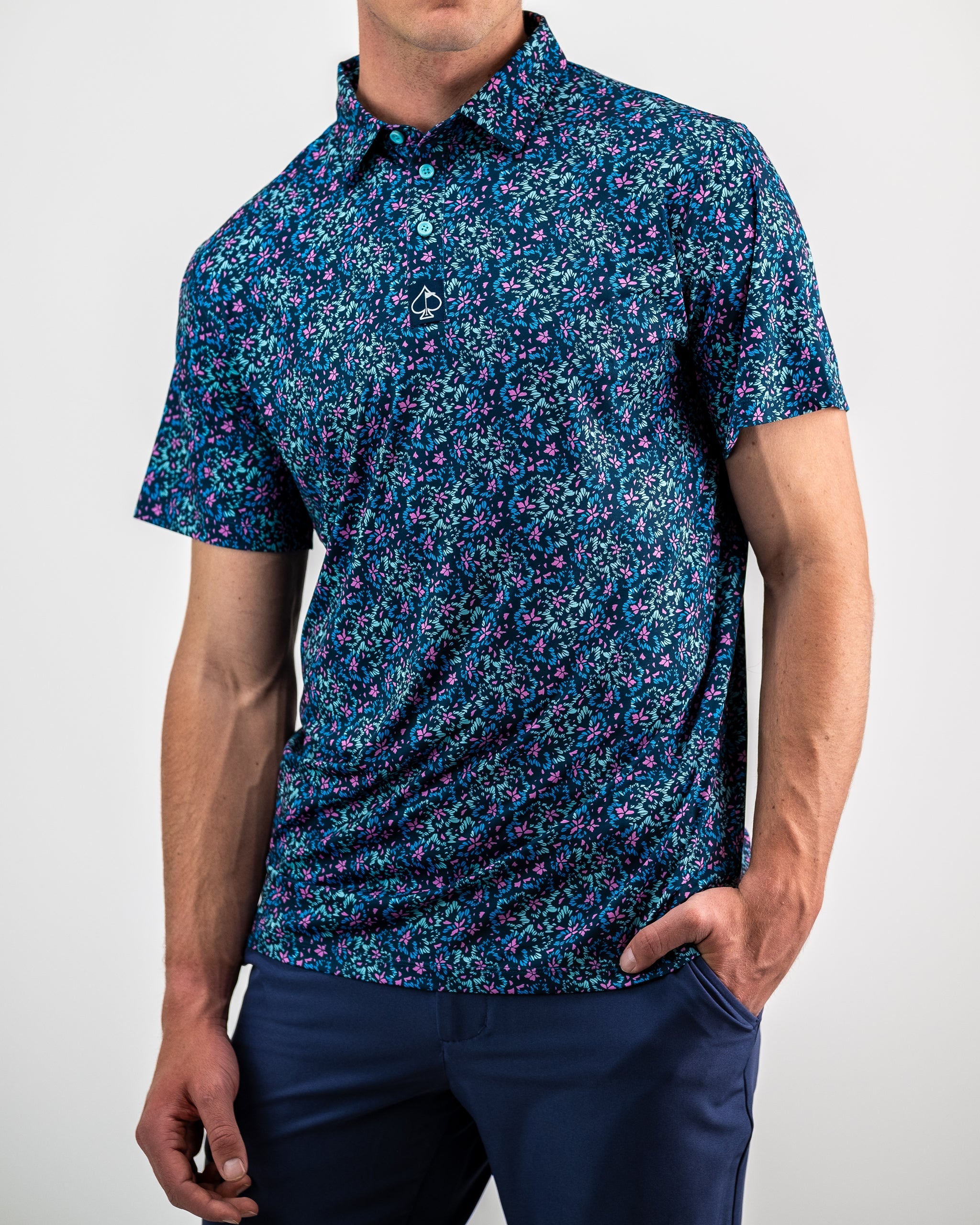 Fluorescent floral print fabric featuring vibrant colors and bold patterns.