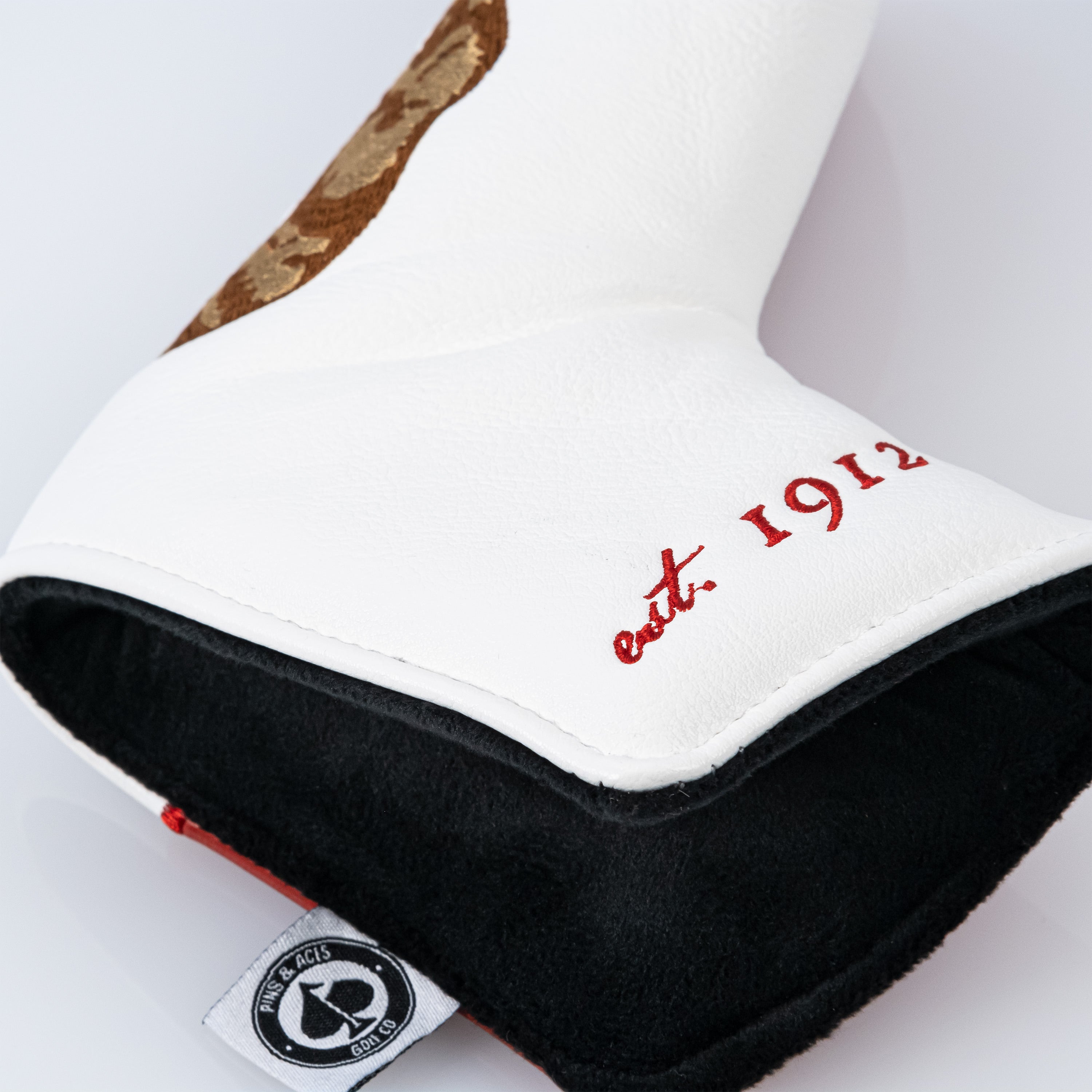 California State Flag Blade Putter Cover featuring a white exterior, gold accents, and red lettering for a bold golf look.