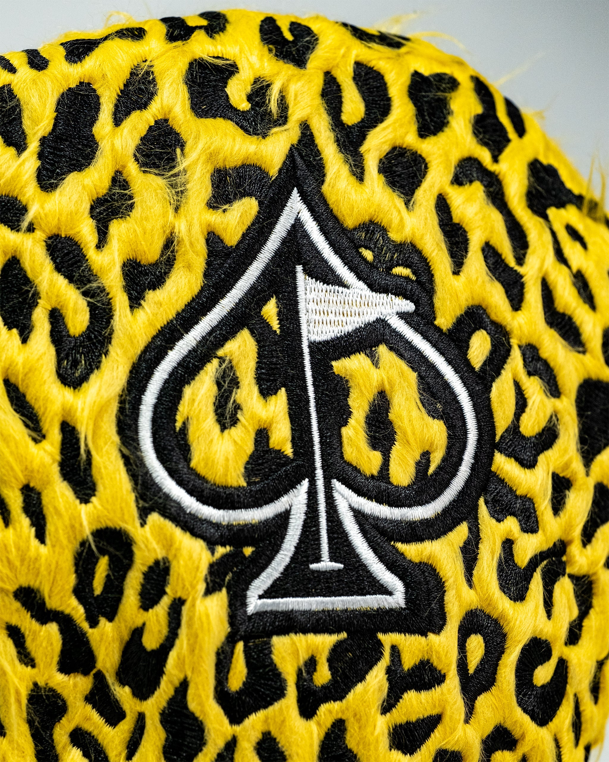Leopard driver cover for golf clubs, featuring a realistic leopard design with detailed fur patterns.