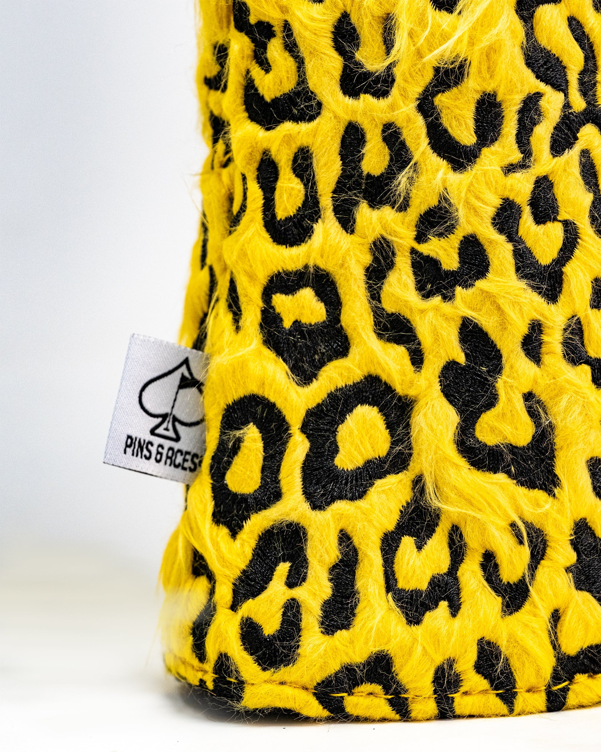 Leopard print golf driver cover showcasing a realistic leopard head design for stylish club protection.