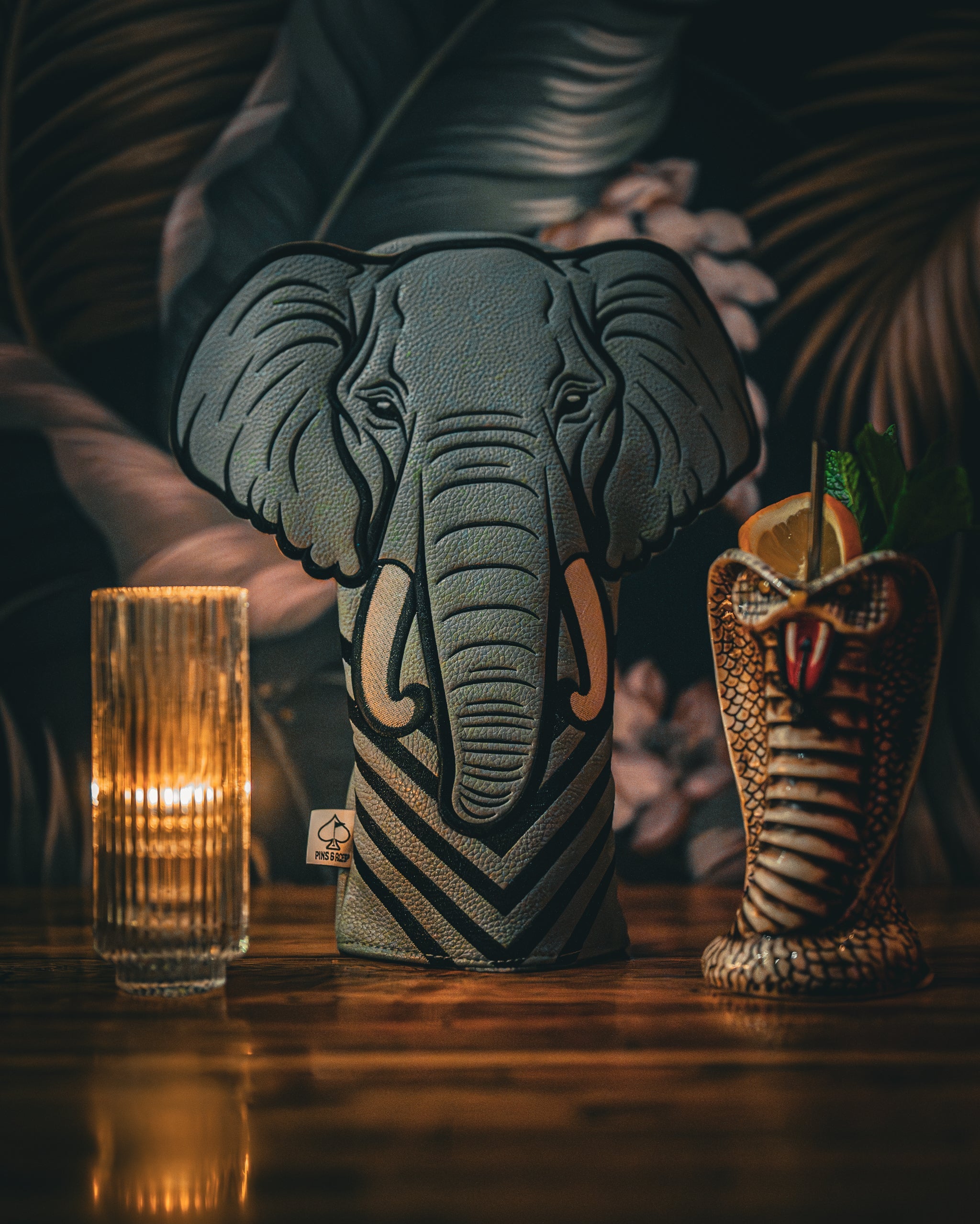 Elephant driver cover featuring realistic design and soft plush material, ideal for golf club protection.