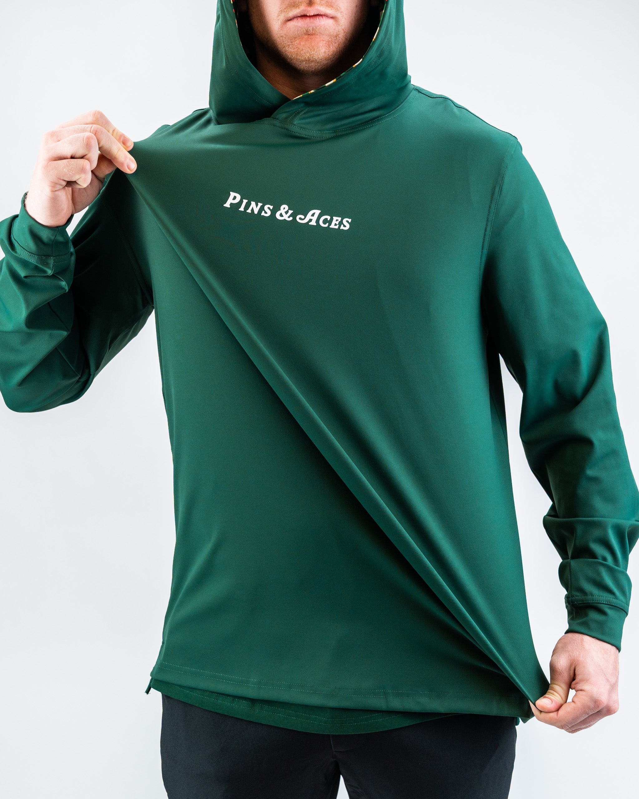 Performance Golf Hoodie in Pimento 4.0, showcasing a vibrant red color and sporty design, ideal for golfers.