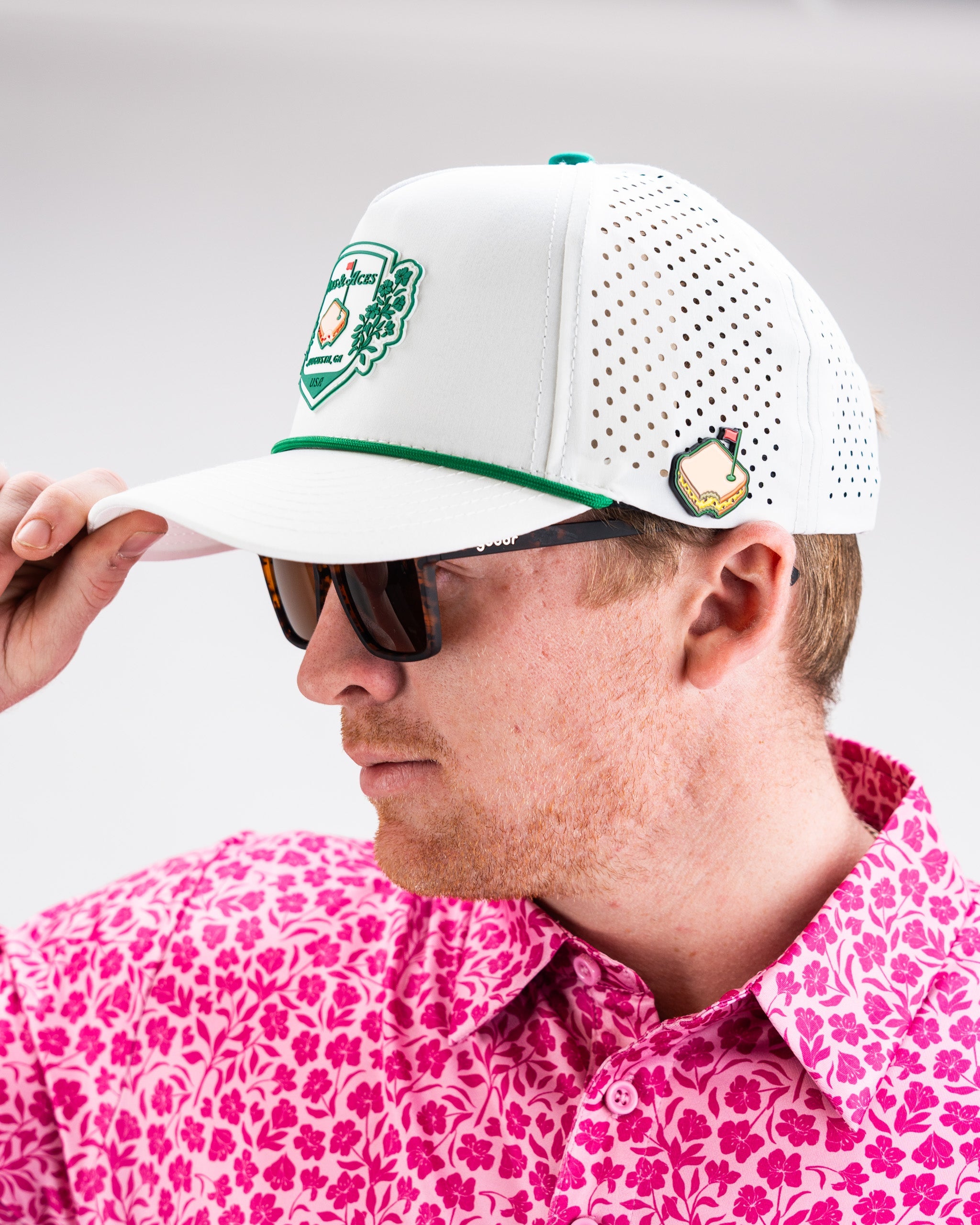 White perforated rope hat by Pimento Crest, featuring a stylish design and adjustable fit.