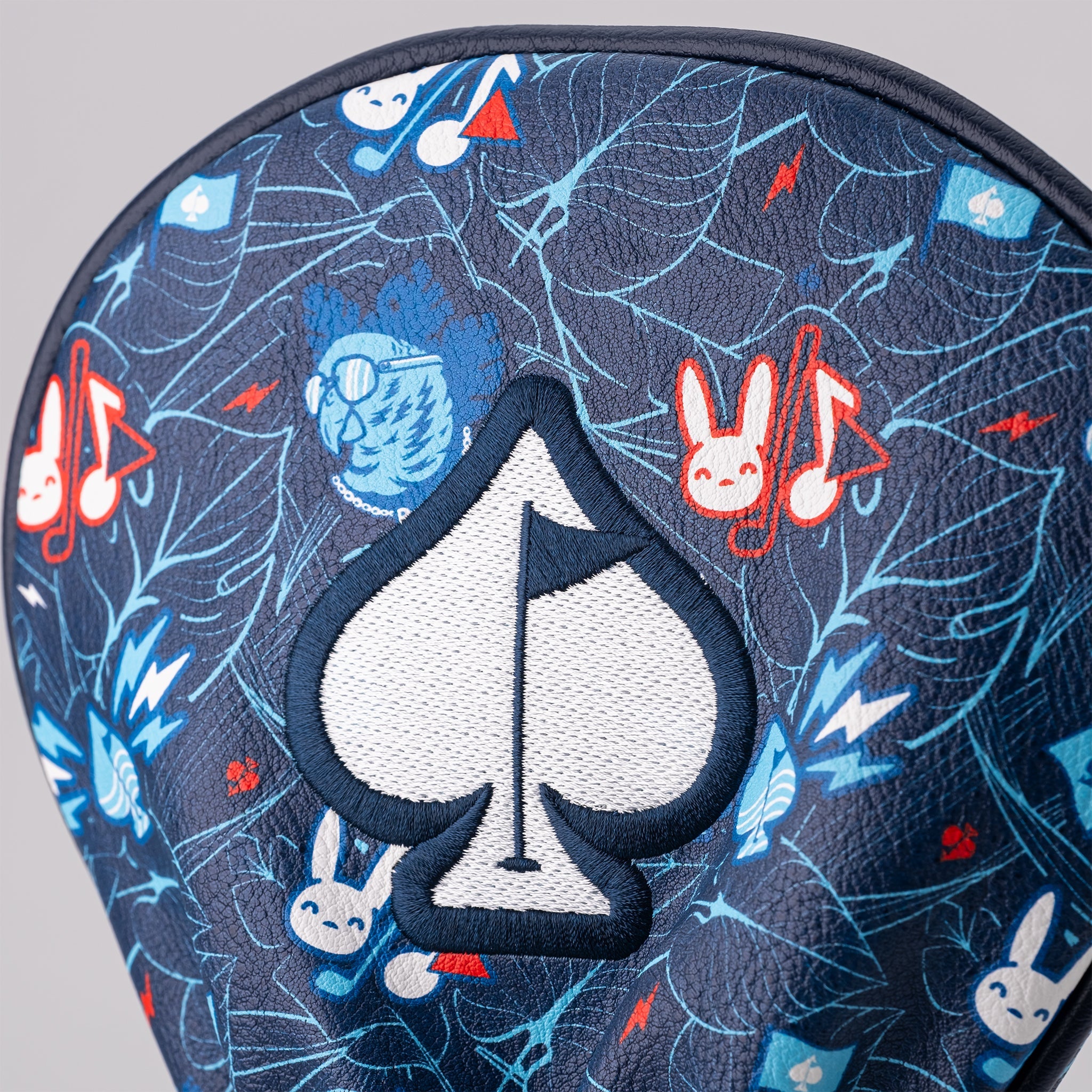 Good Bunny X Fundación Rimas driver cover featuring a colorful design with a bunny logo on a soft fabric.