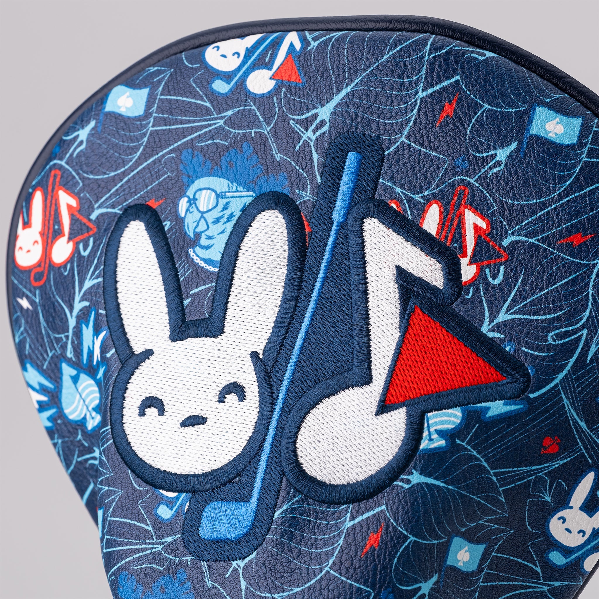 "Good Bunny X Fundación Rimas driver cover featuring a vibrant design with a playful bunny motif, ideal for golf enthusiasts."