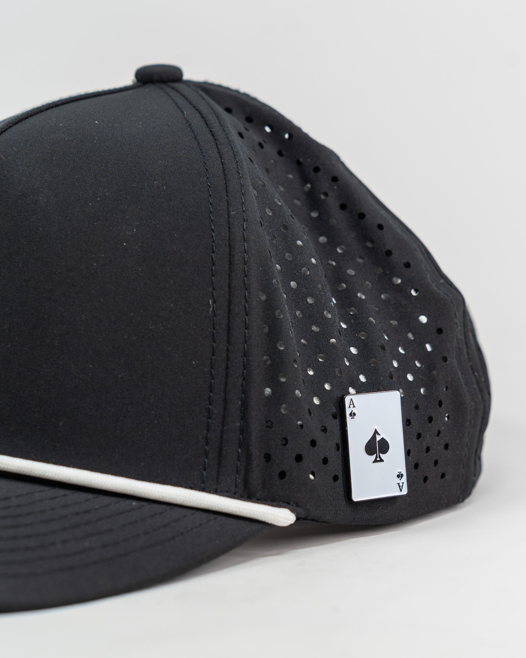Perforated black rope hat featuring "Beaver Liquor" logo on front.