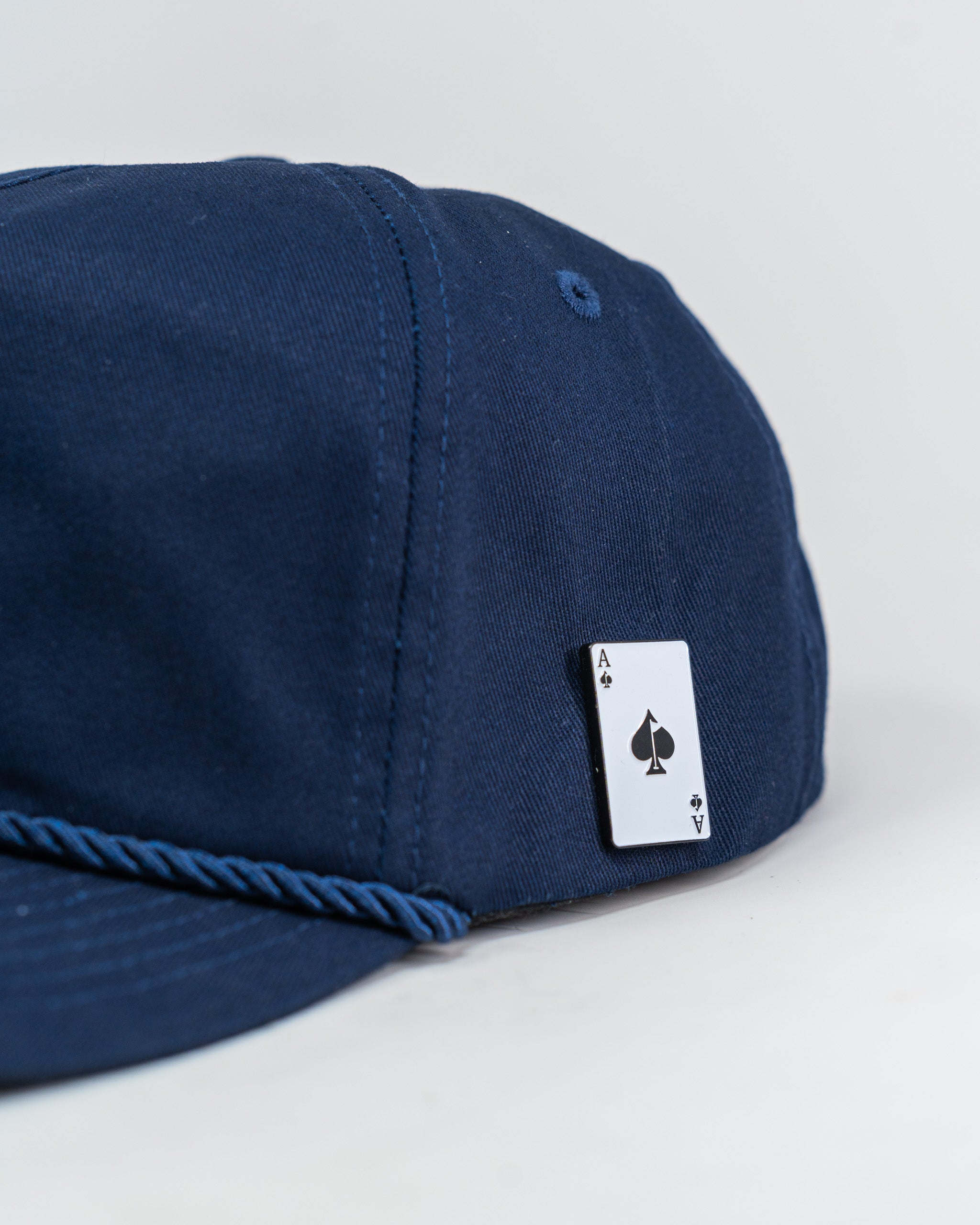 Heritage Rope Hat in navy blue with a braided rope detail along the brim.