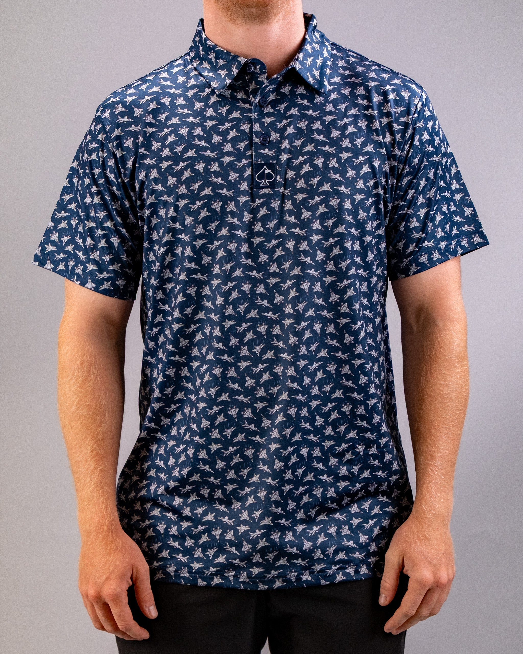 Men's navy golf polo shirt featuring a white bird of steel pattern and a small spade logo on the chest.