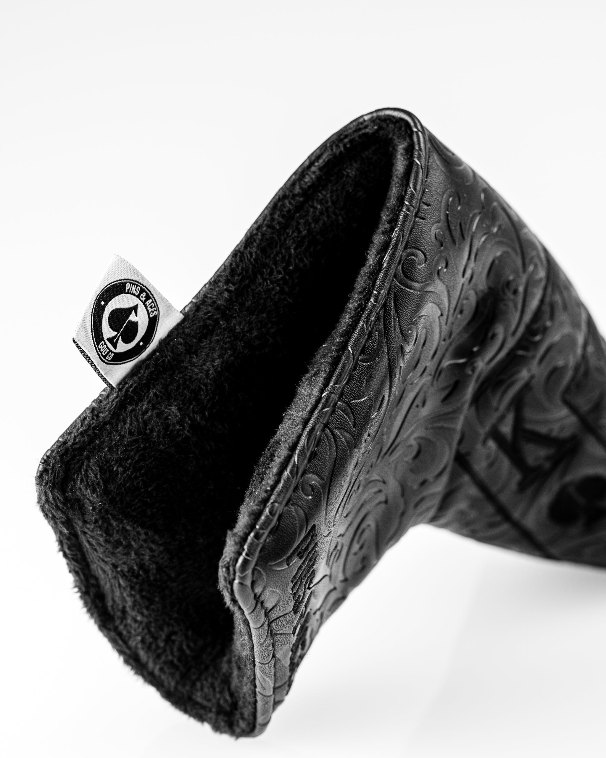 Blackout Ace of Spades blade putter cover featuring a sleek black design with spade emblem, designed for optimal protection and style.