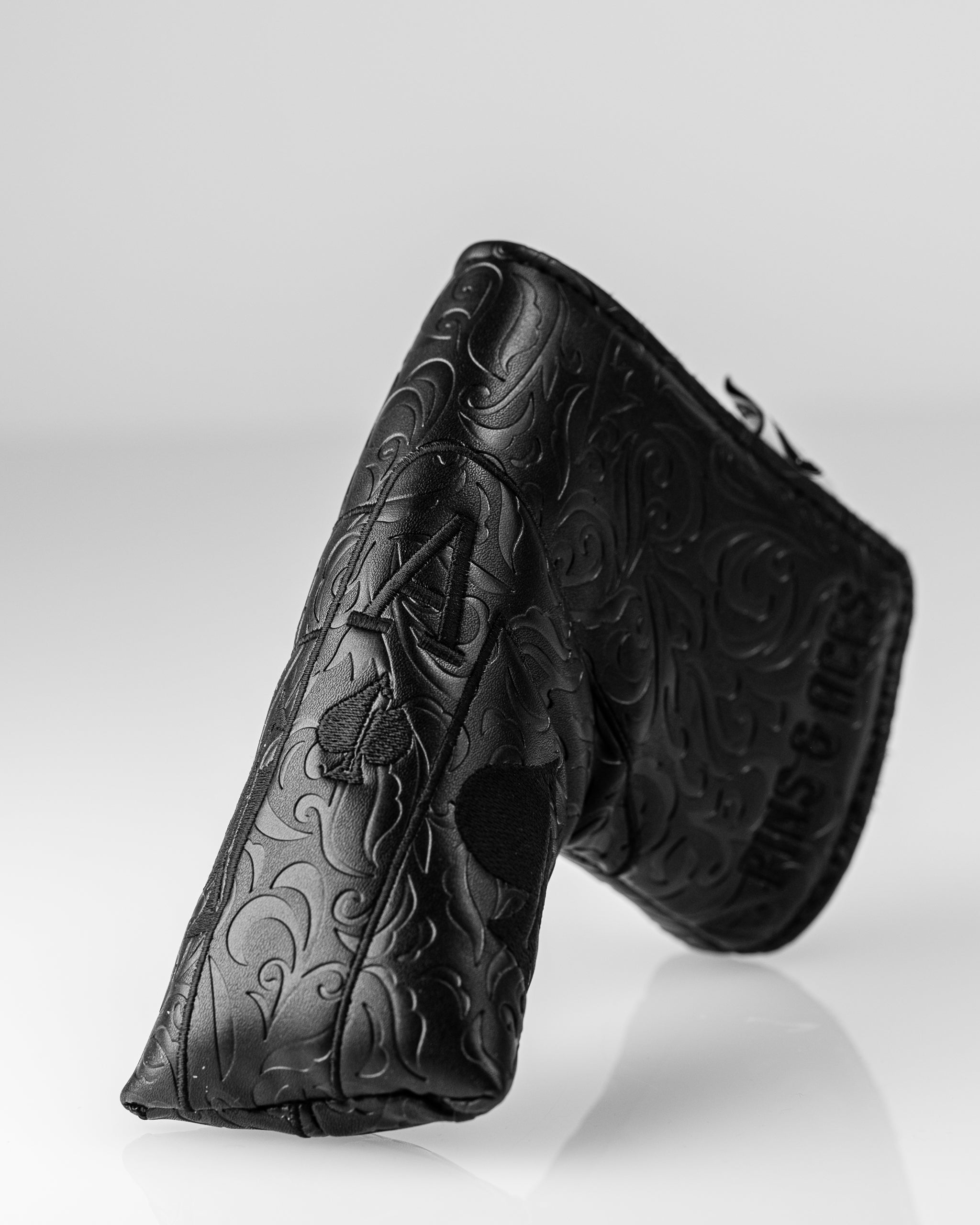 Blackout Ace of Spades Blade Putter Cover, featuring a sleek black design with spade emblem, ideal for golf enthusiasts.