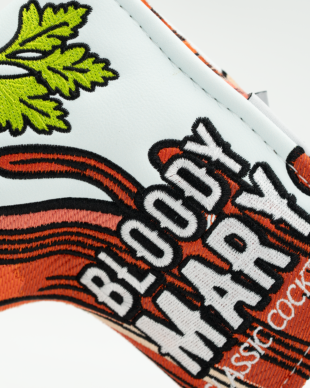 Bold Bloody Mary blade putter cover featuring vibrant graphics and a playful cocktail design for standout style on the course.