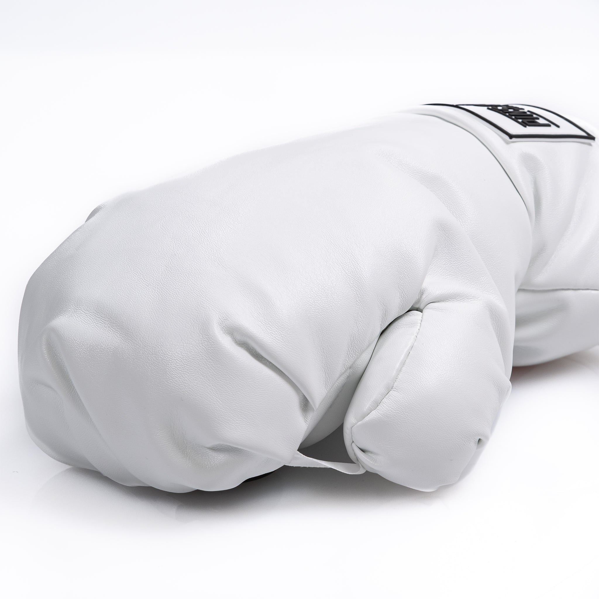 White boxing glove driver cover for golf clubs with a sleek design.