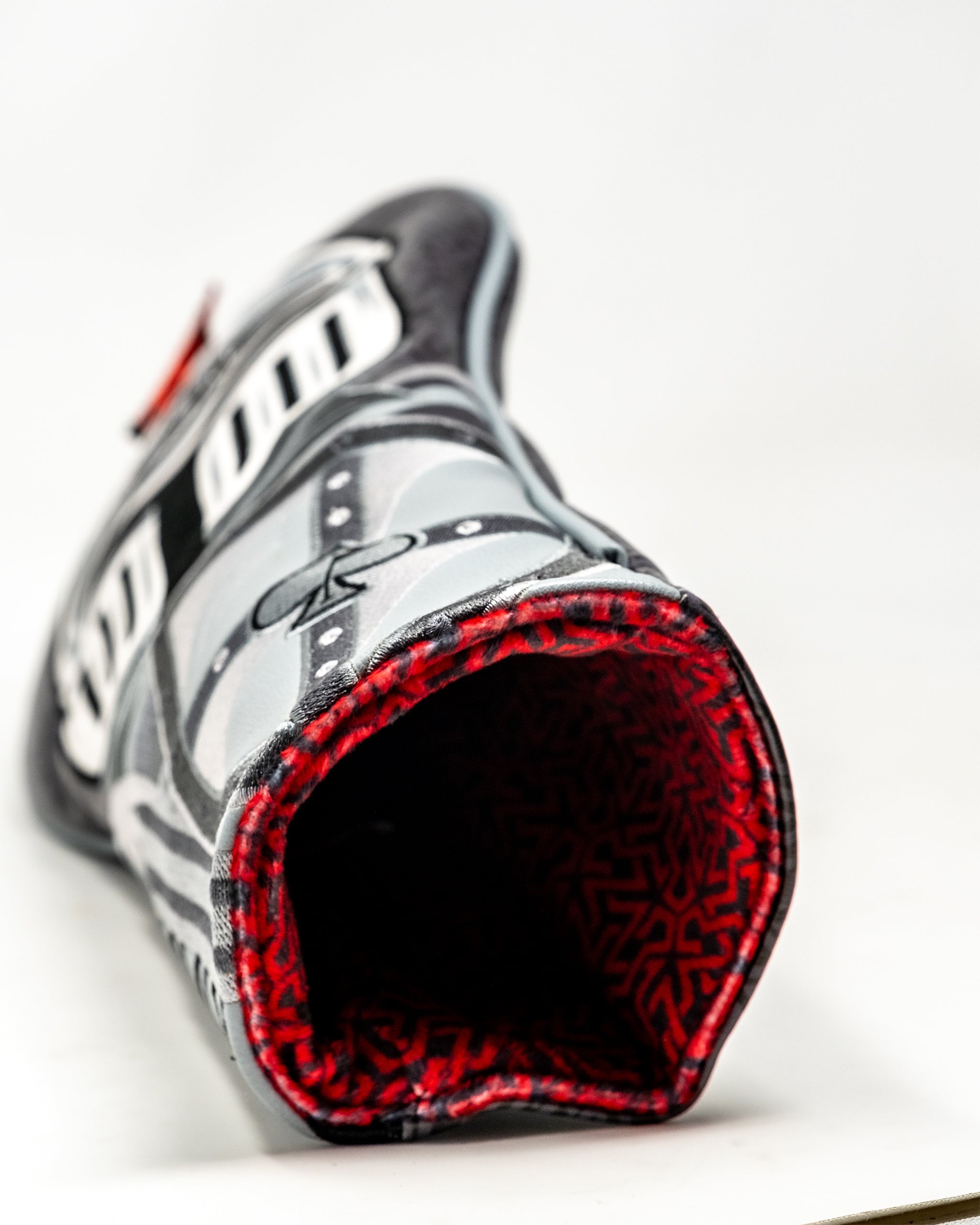 Knight's Valor Driver Cover featuring a regal design with a knight's helmet and bold colors, perfect for golf enthusiasts.