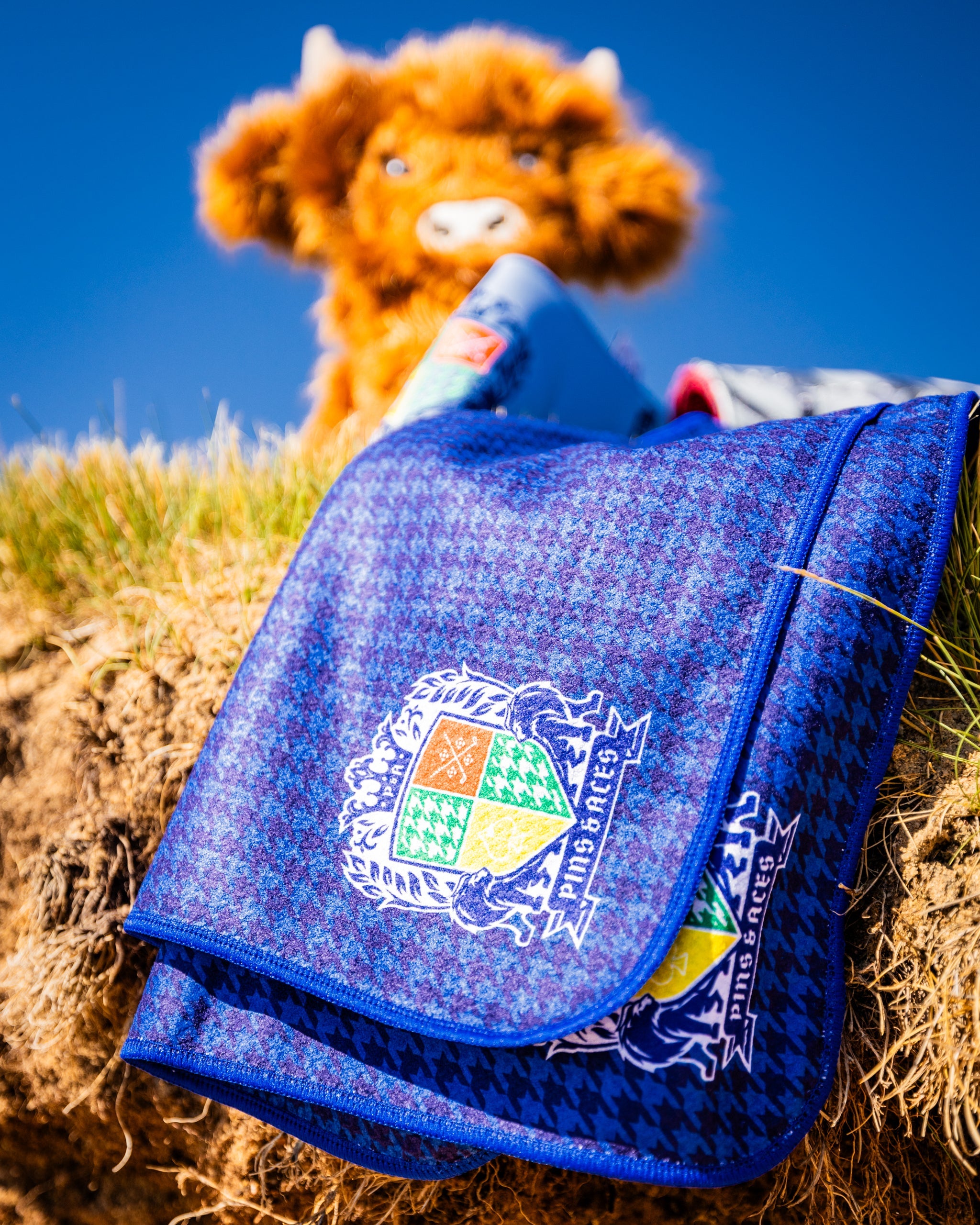 Royal Houndstooth Towel featuring a classic black and white houndstooth pattern, designed for luxury and style.