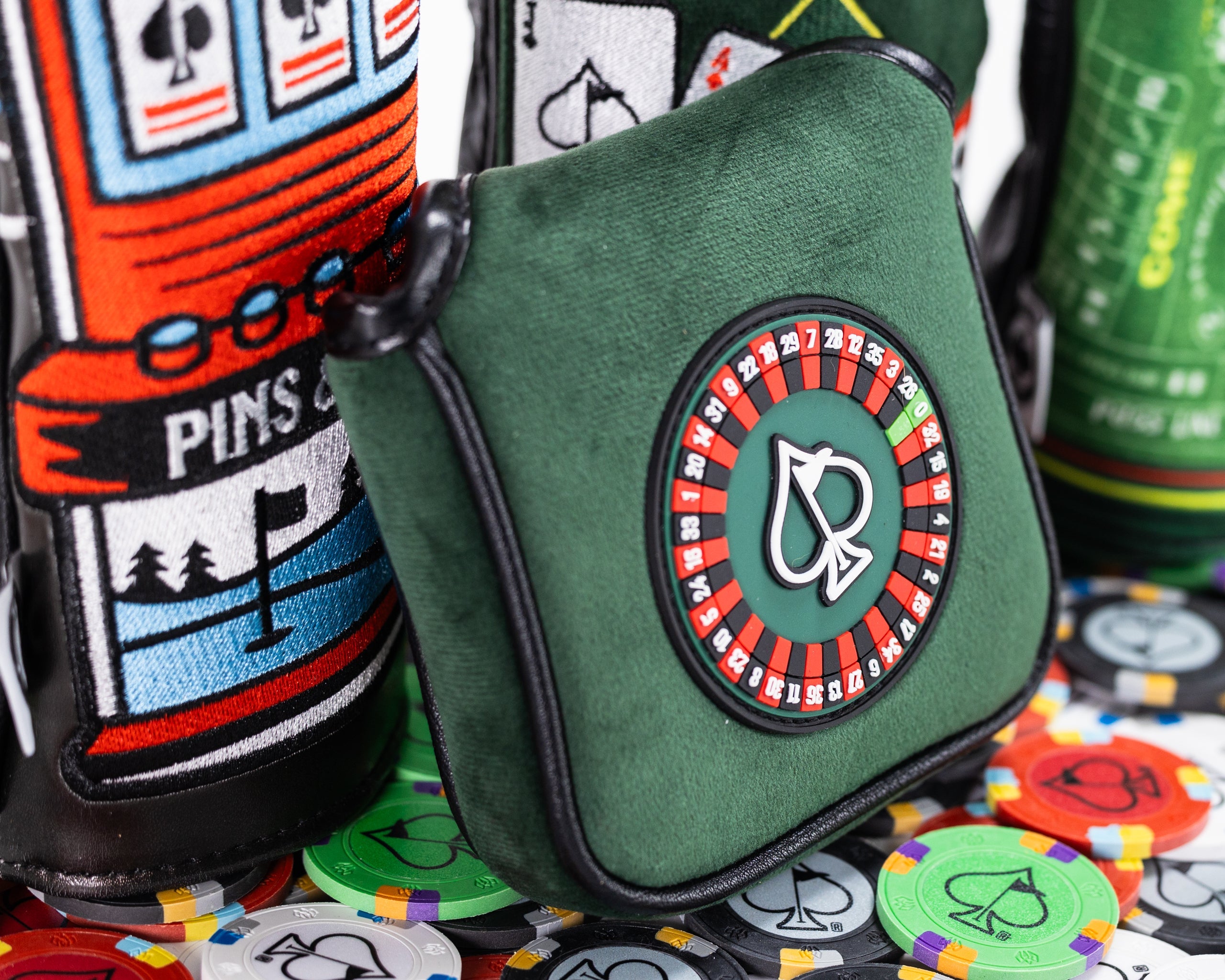 "Roulette-themed mallet putter cover featuring vibrant casino chip design."