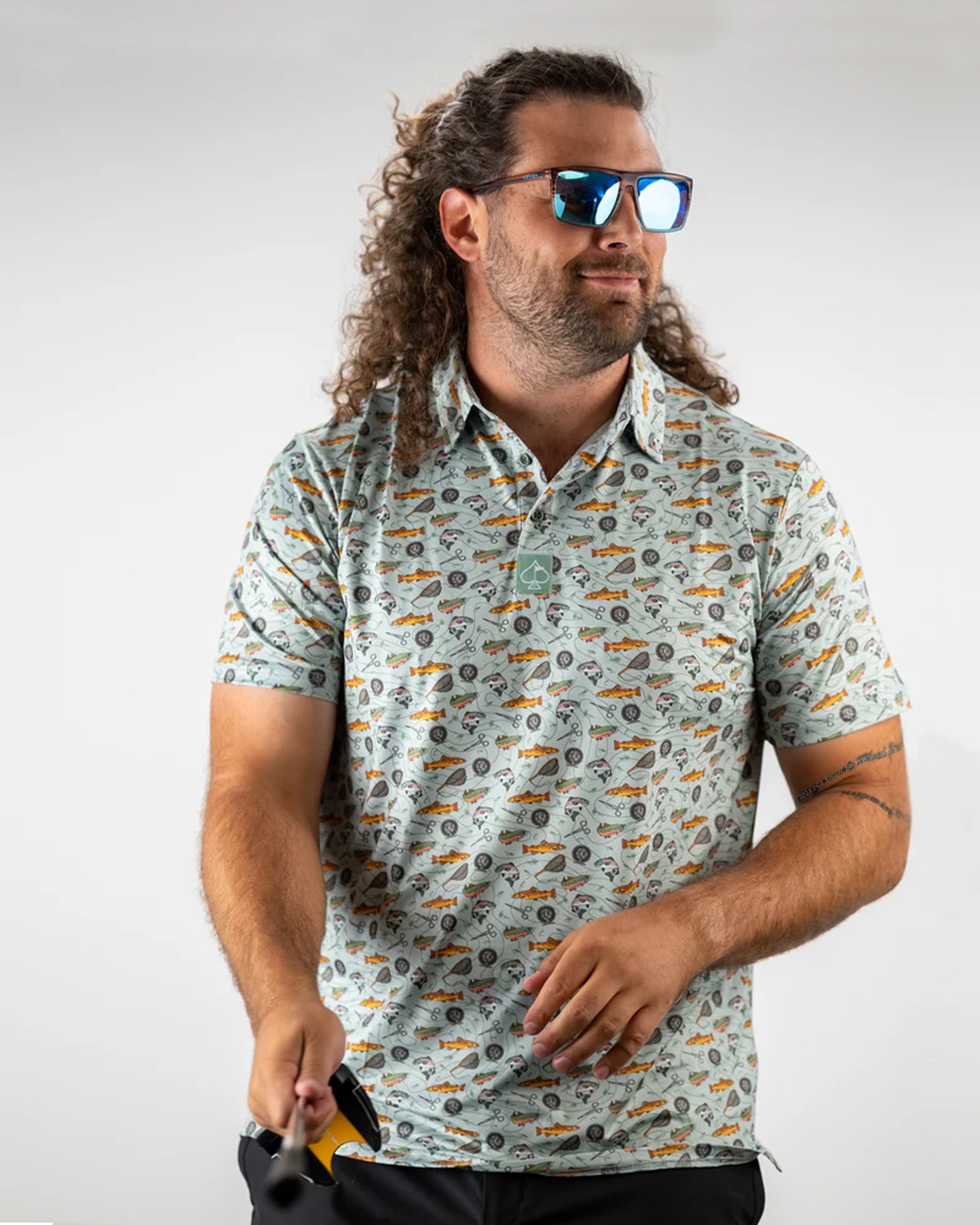 "Artwork titled 'Catch and Release' featuring a vibrant depiction of a fish being released back into water, surrounded by nature."