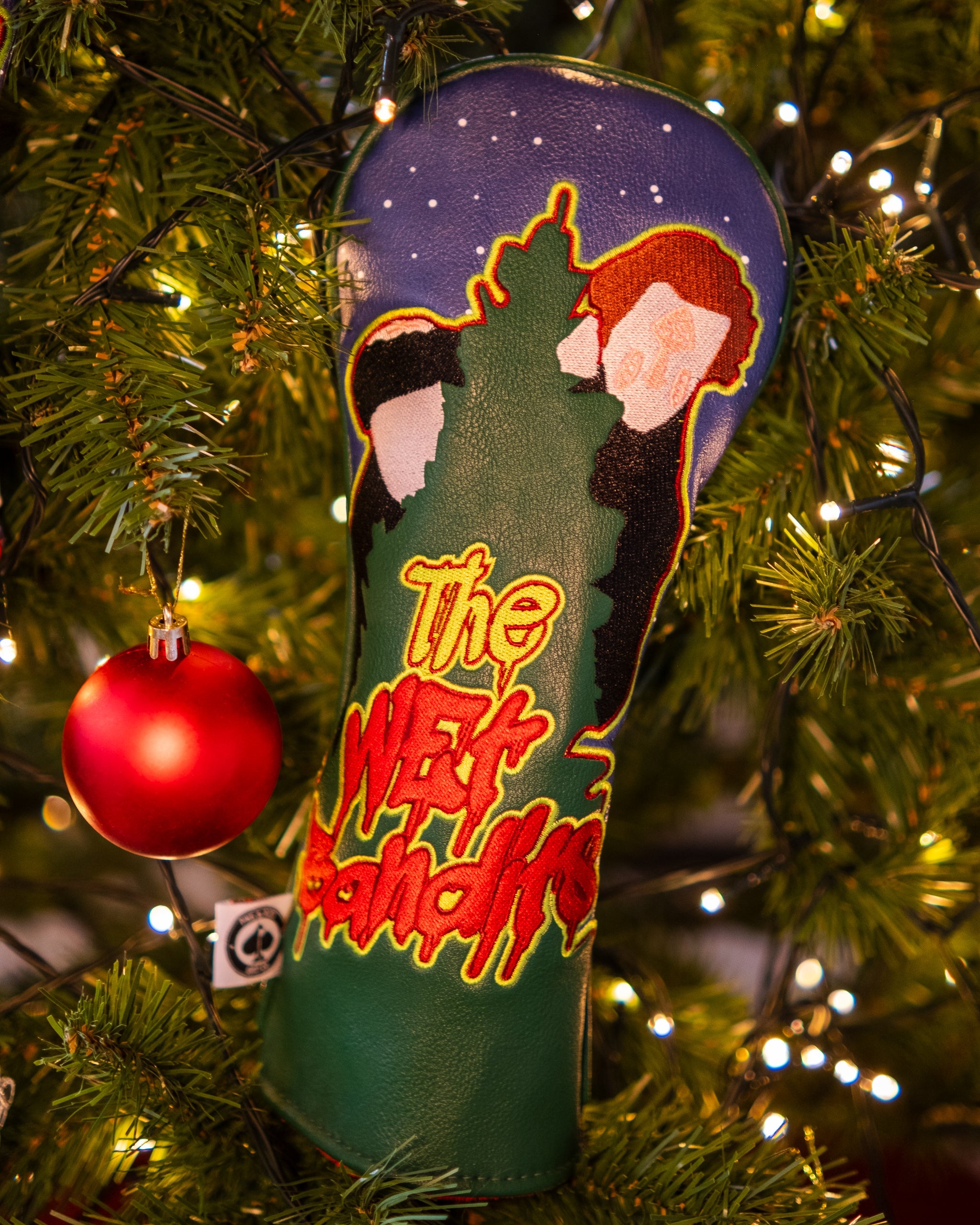 Wet Bandits Fairway Cover featuring a vibrant Christmas tree design, perfect for holiday-themed golf outings.
