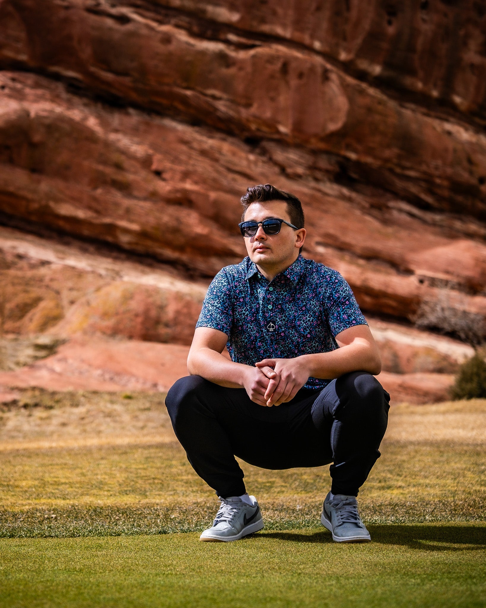 Fluorescent floral-patterned fabric with vibrant colors in a decorative display.