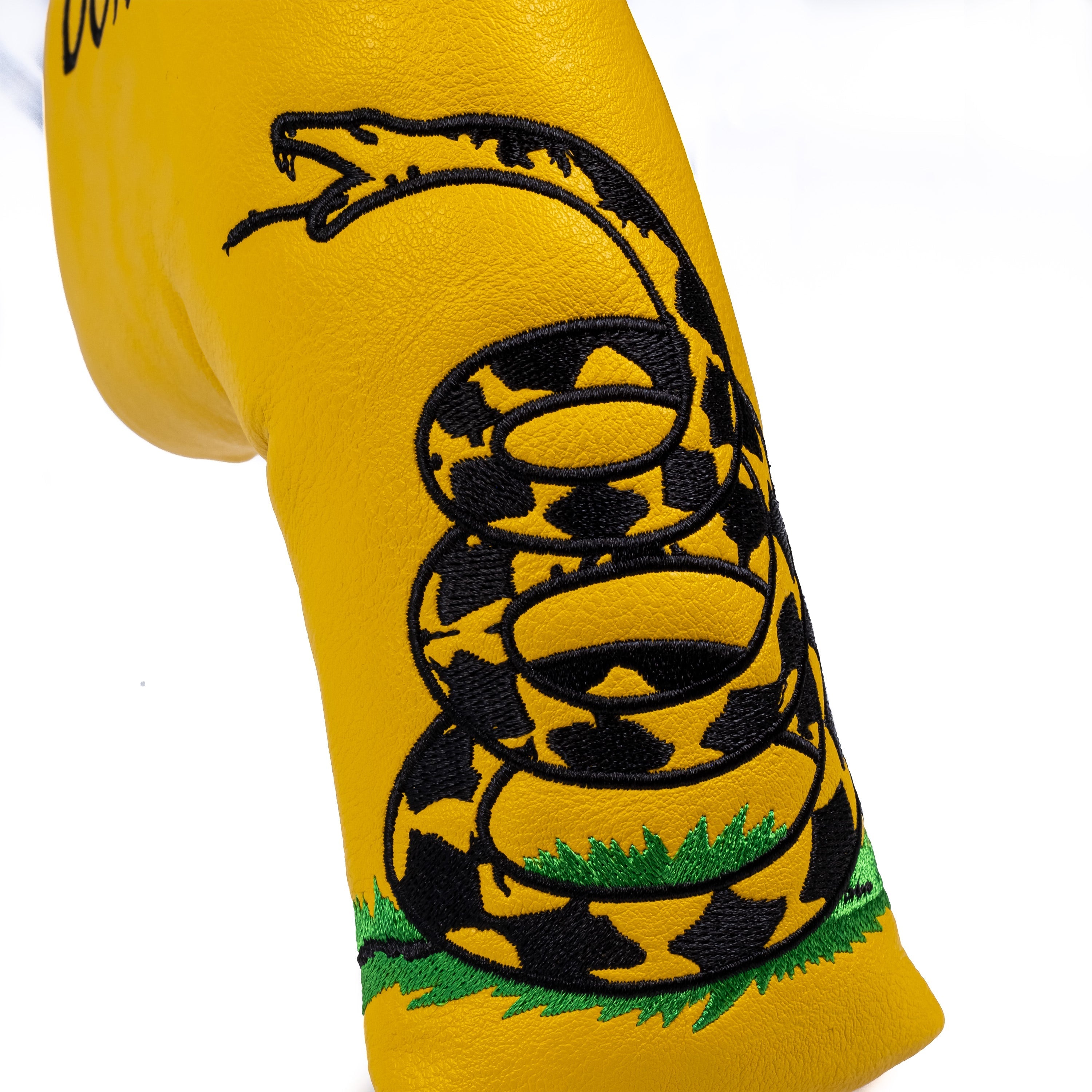 "Don't Tread on Me blade putter cover featuring a detailed snake graphic and durable material."