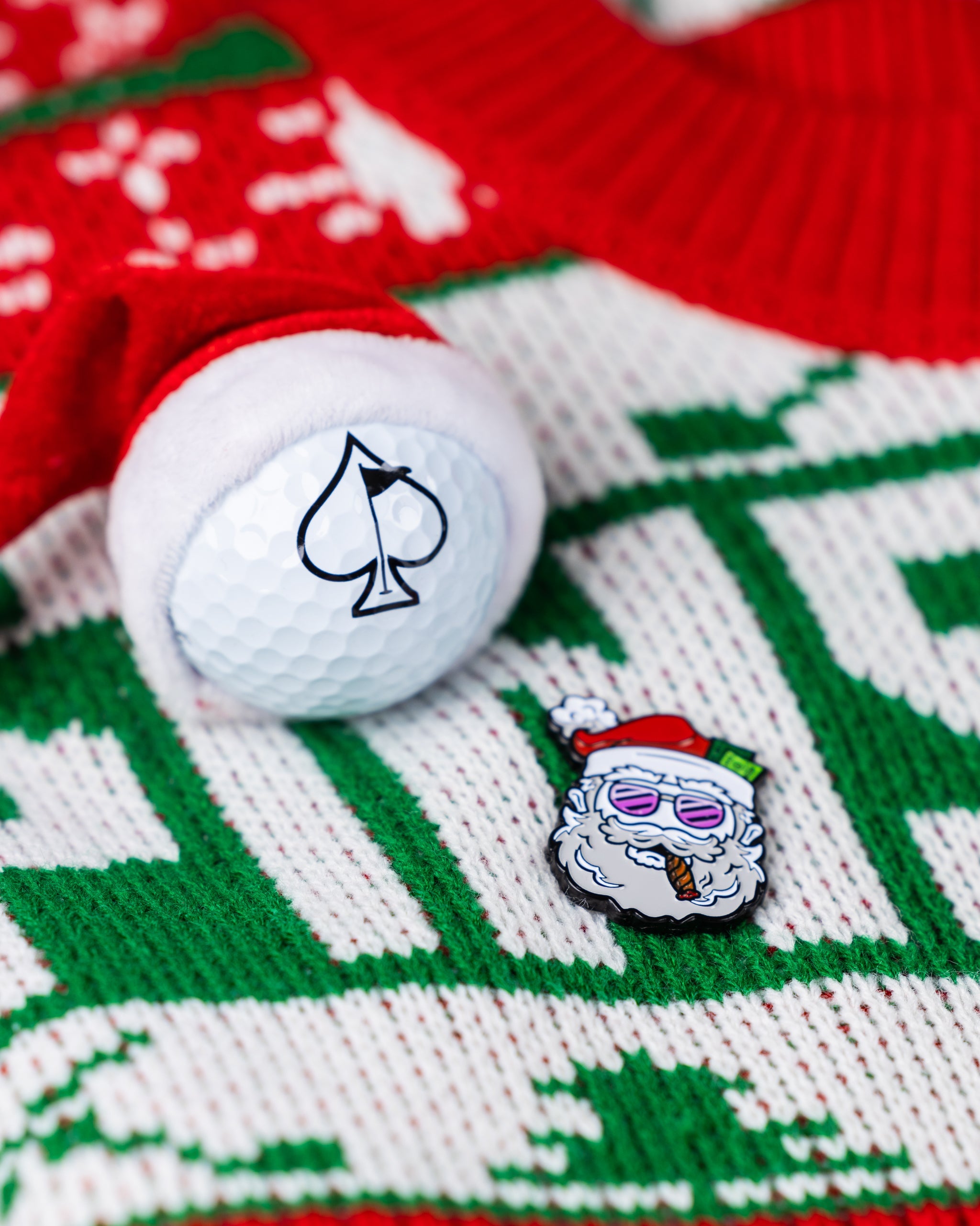 Alt text: "Santa the Degenerate Ball Marker featuring a whimsical Santa holding a drink, designed for golf enthusiasts."
