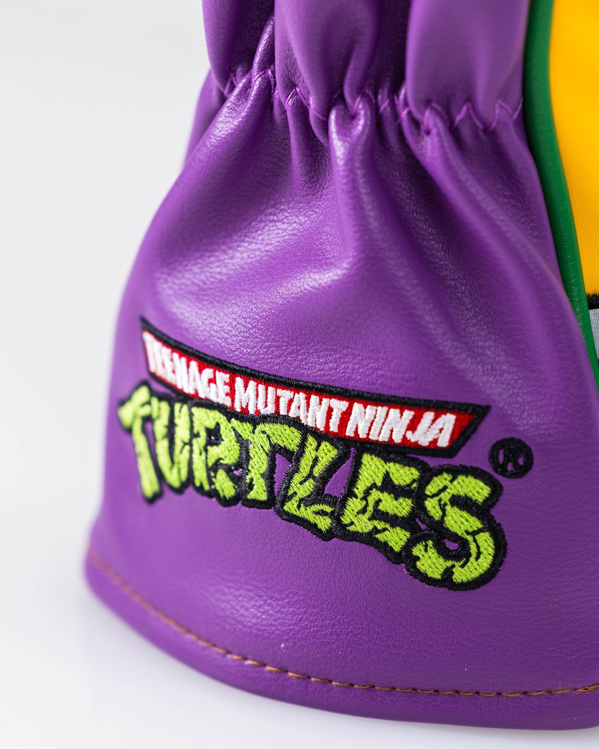 TMNT Donatello Fairway Cover featuring a colorful design of the character with green and purple accents, perfect for protecting golf clubs.