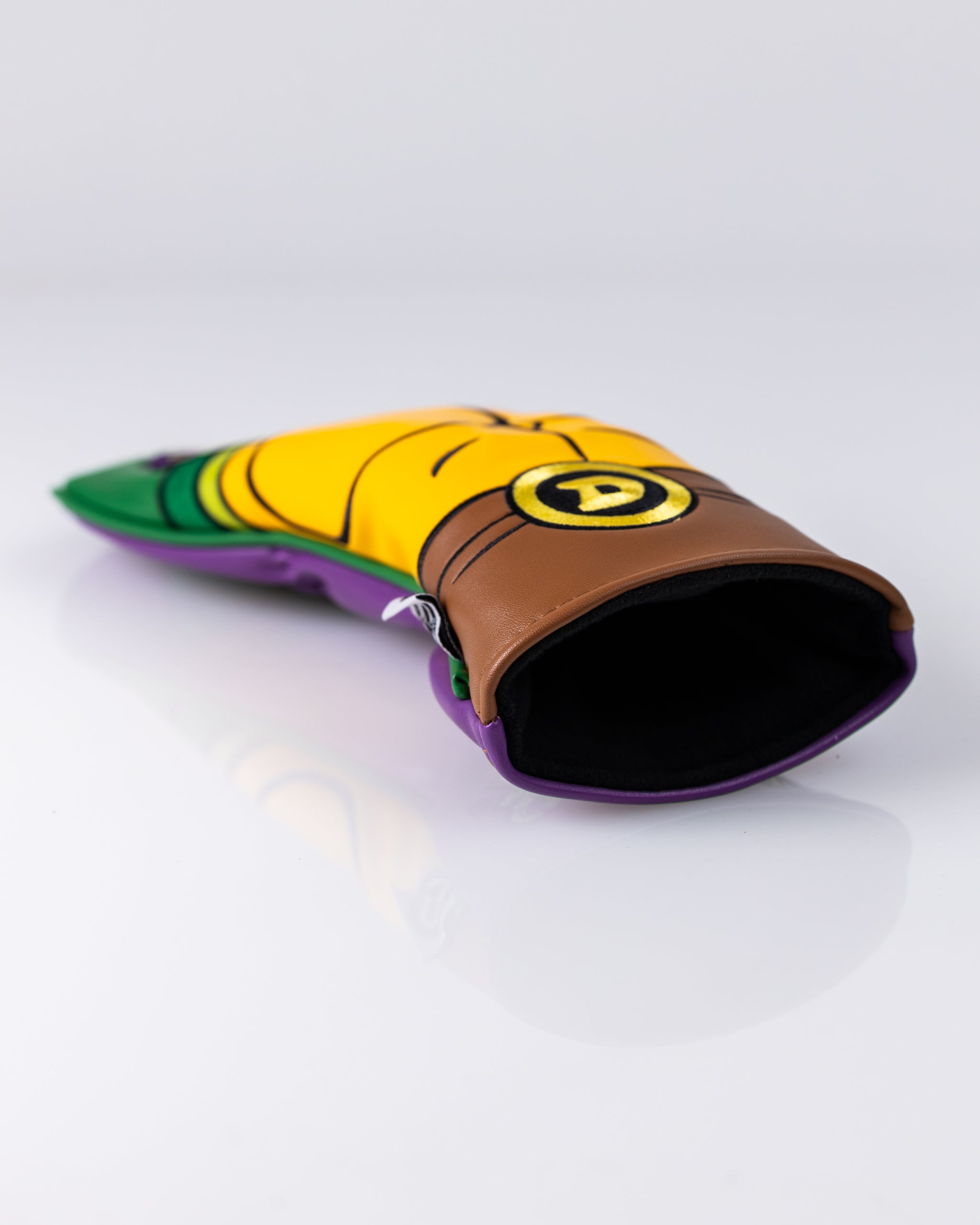 TMNT Donatello hybrid golf club cover featuring a cartoon design of Donatello with his signature purple mask and staff.