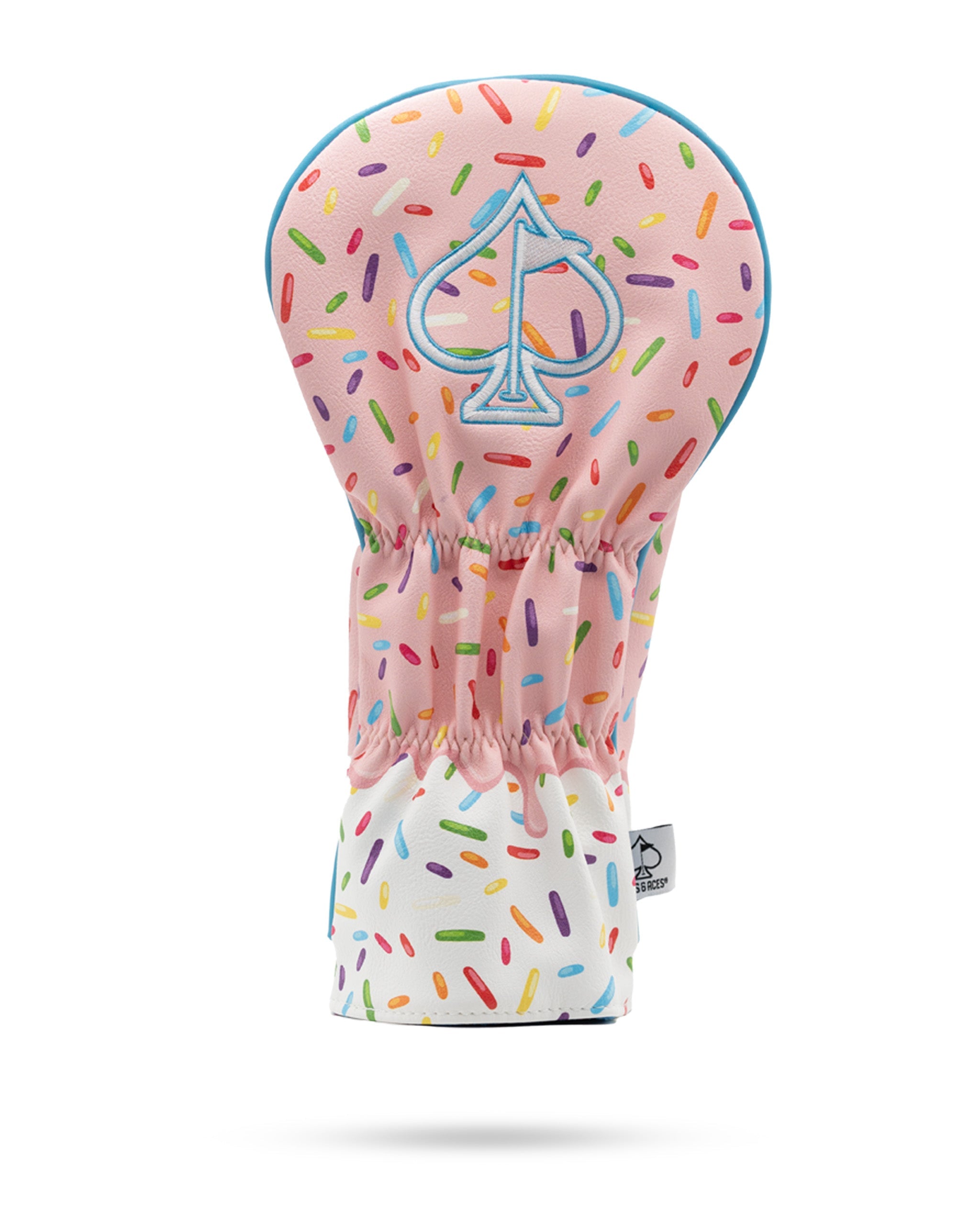 Pink driver cover with colorful sprinkles design and spade logo, offering a fun and playful look for golfers.
