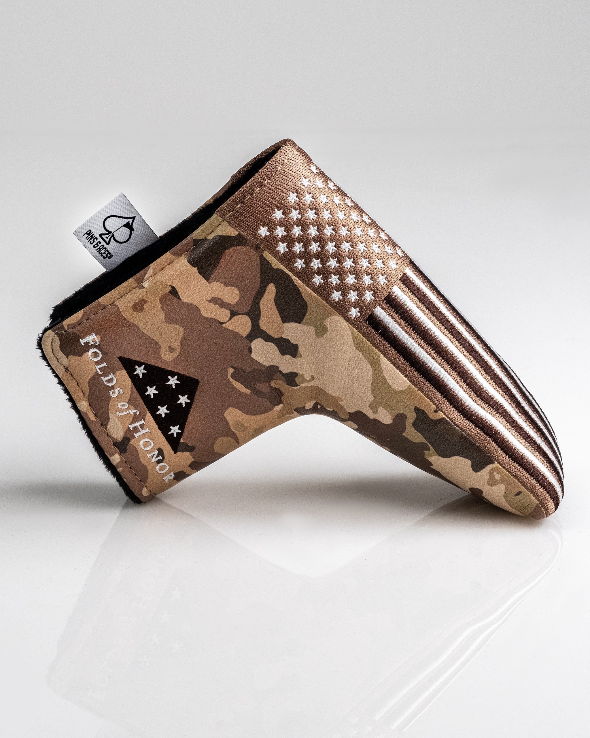 Folds of Honor 2.0 Blade Putter Cover in black and red with embroidered logo.