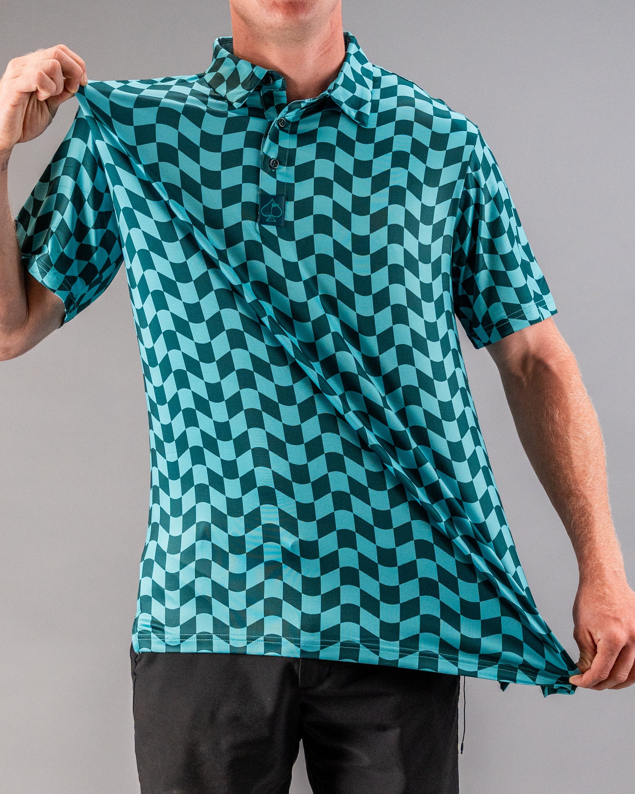 Men's wavy checkered golf polo shirt in teal and black, showcasing a bold pattern and lightweight fabric.