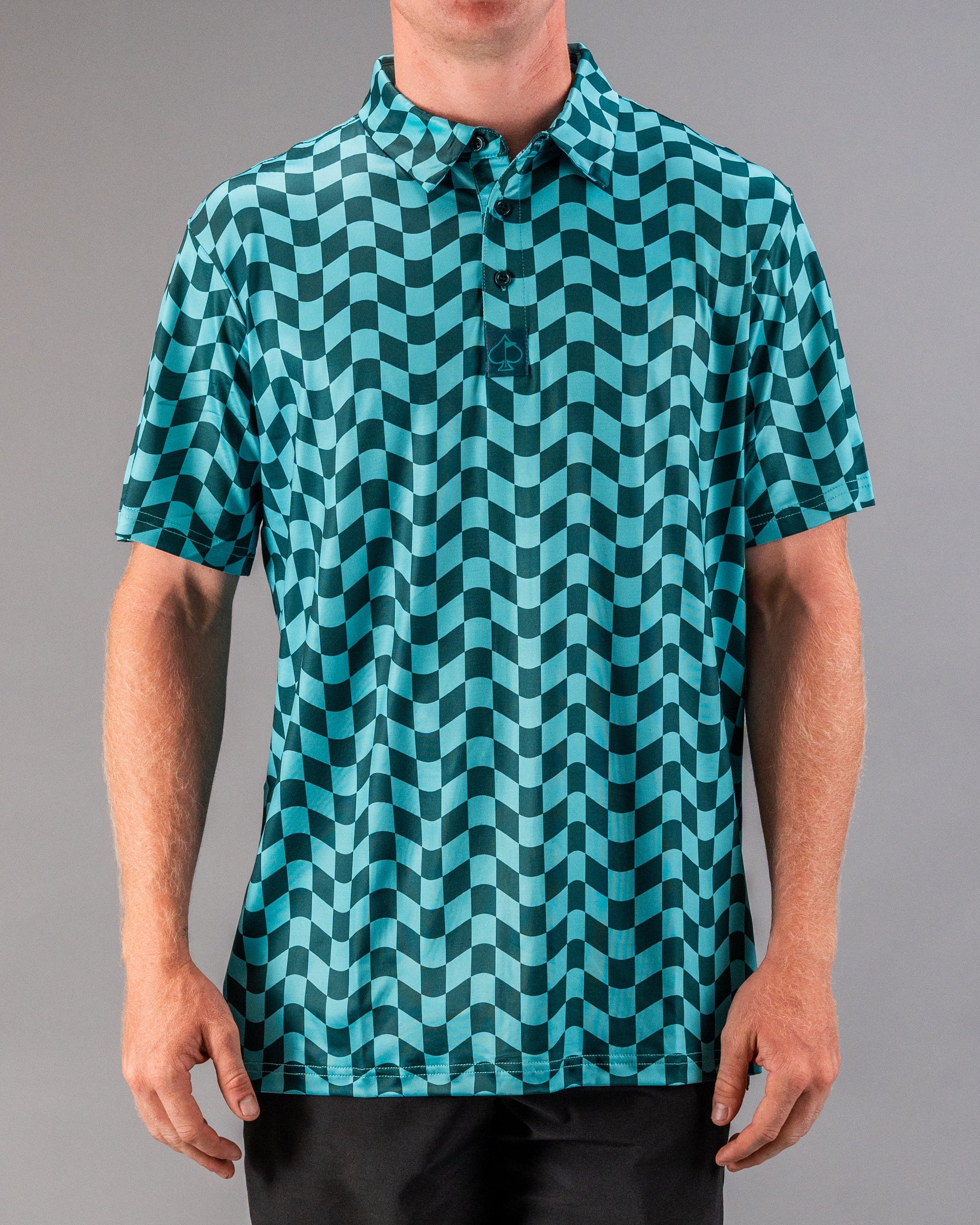 Men's golf polo featuring a bold wavy checkered pattern in teal and black, designed for stylish performance on the course.