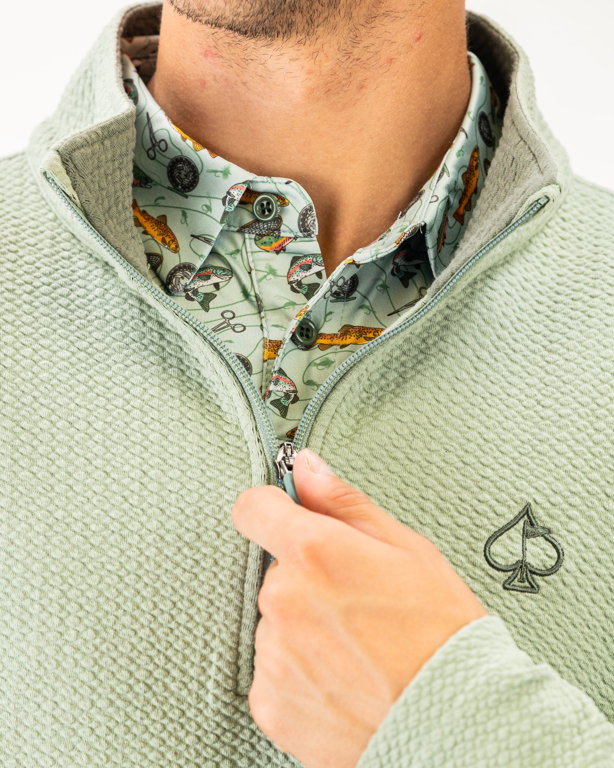 Olive green Player Preferred™ waffle knit pullover with long sleeves and round neckline.