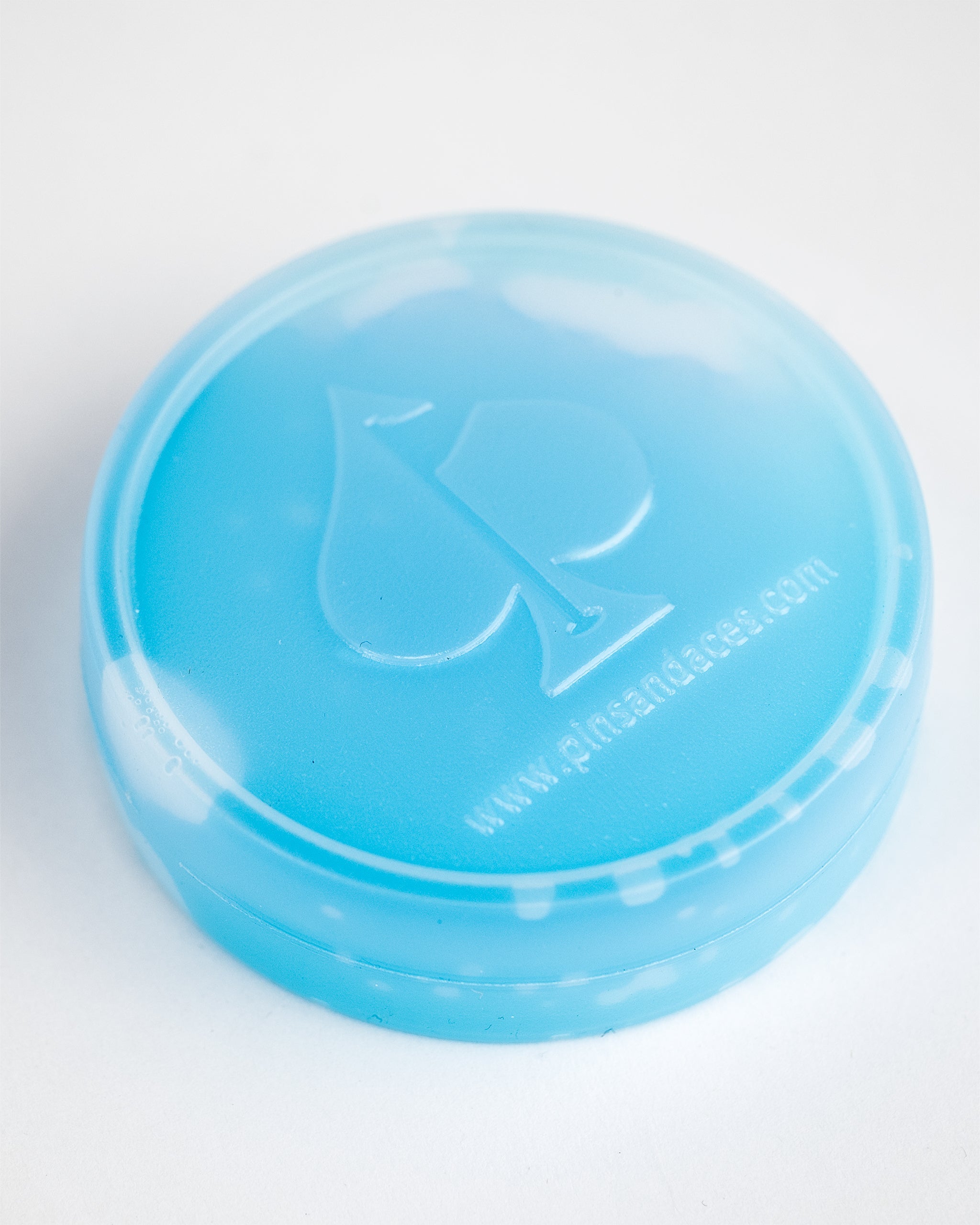 "Beer Sleeve Ice Pucks in blue, designed to keep drinks cold, featuring a sleek, durable design."
