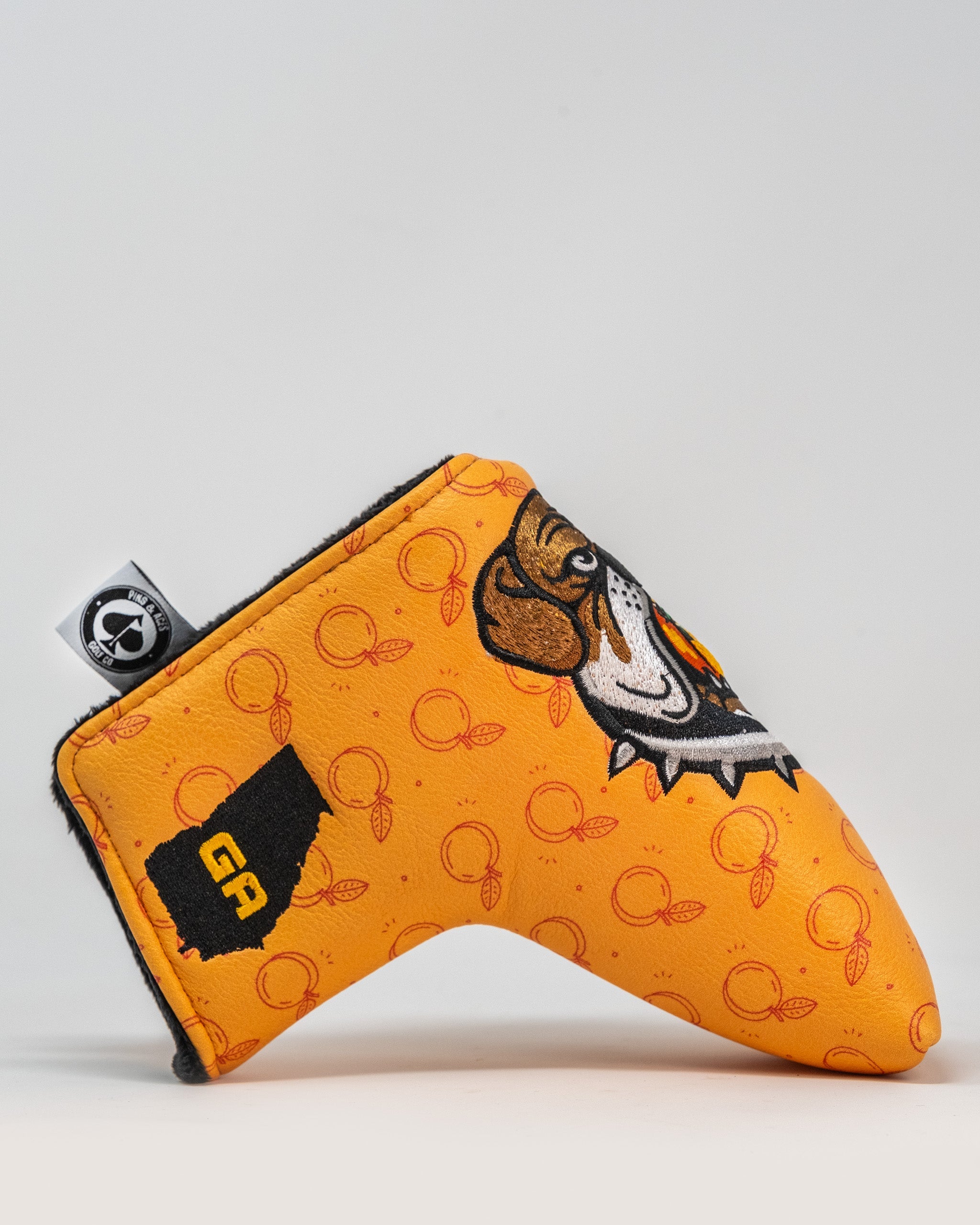 Dawg Country Blade Putter Cover featuring a bulldog design on a vibrant background.