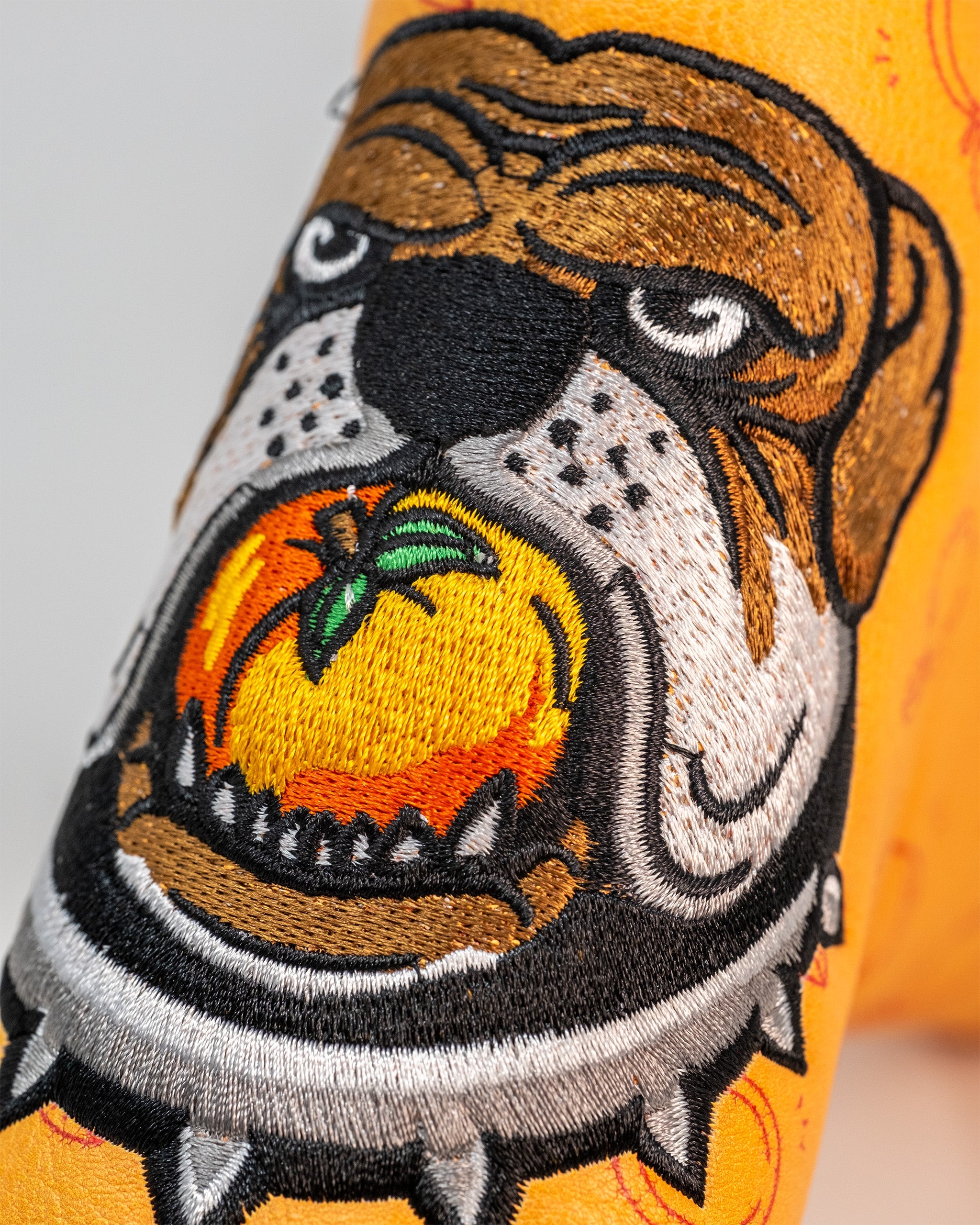 Dawg Country Blade Putter Cover with bulldog design, featuring a vibrant color scheme and durable exterior.