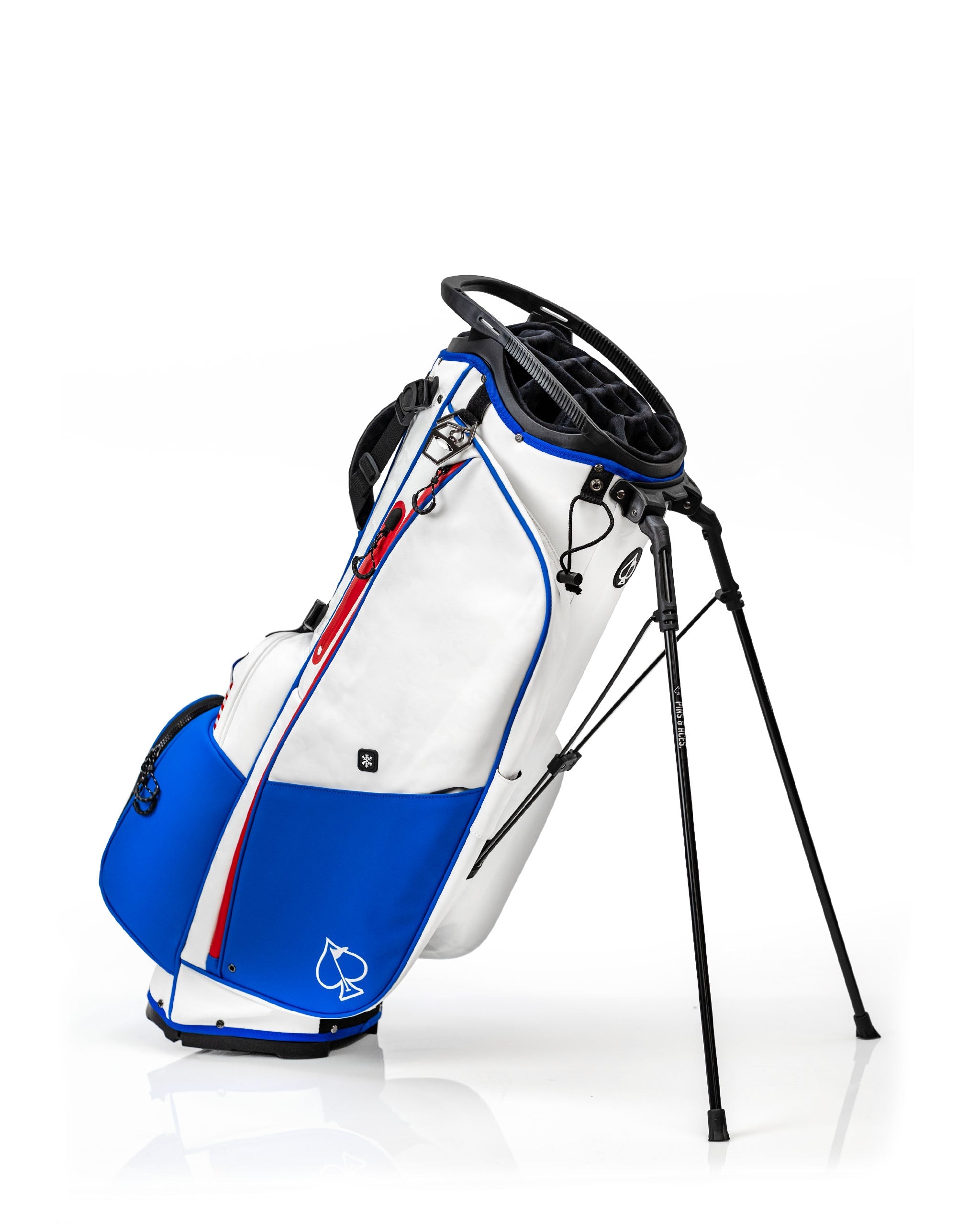 Player Preferred golf bag with a white, blue, and red design, featuring multiple compartments and a stand for easy carrying.