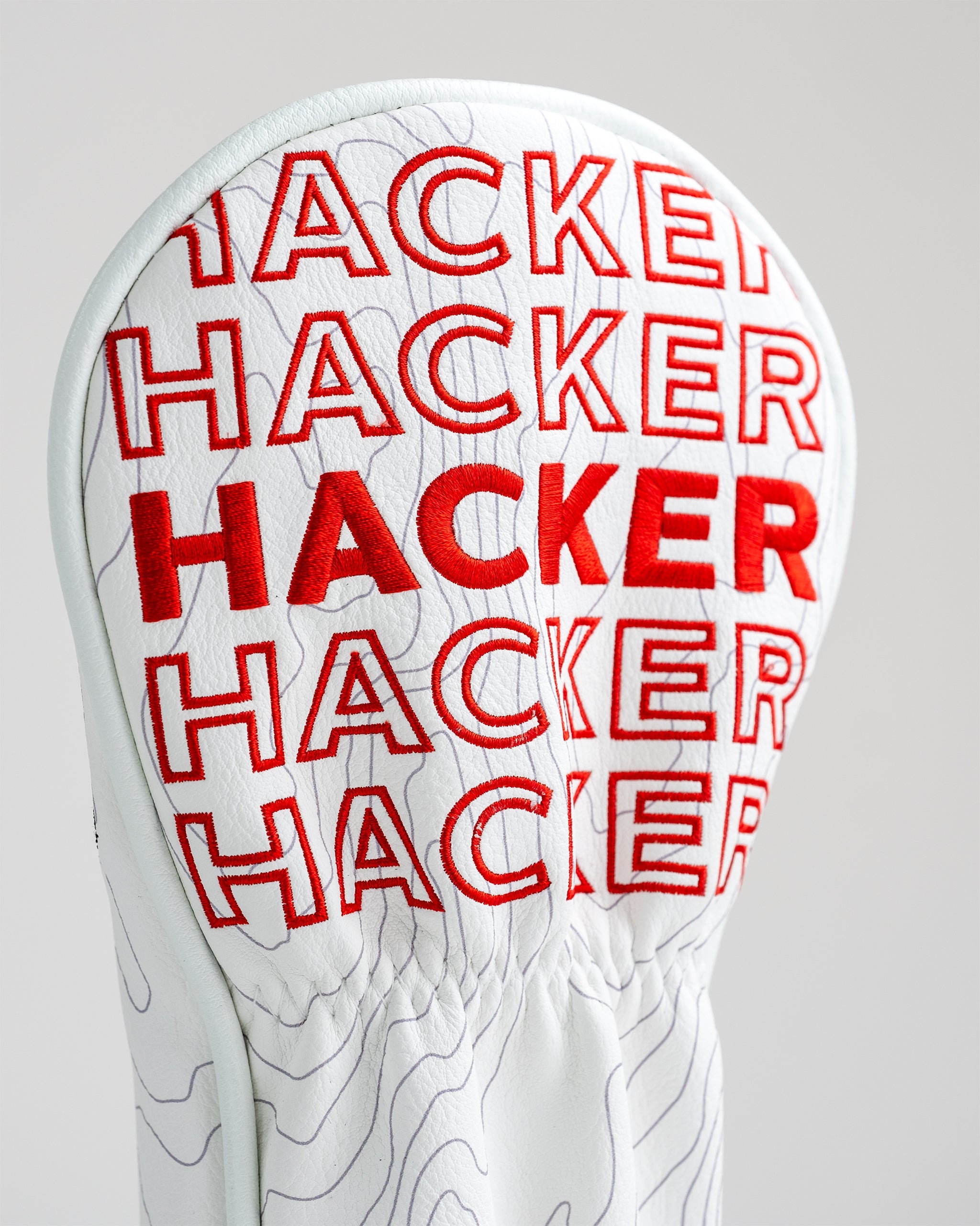 Hacker Fairway Cover featuring a sleek design with vibrant colors and playful graphics, ideal for golf enthusiasts.