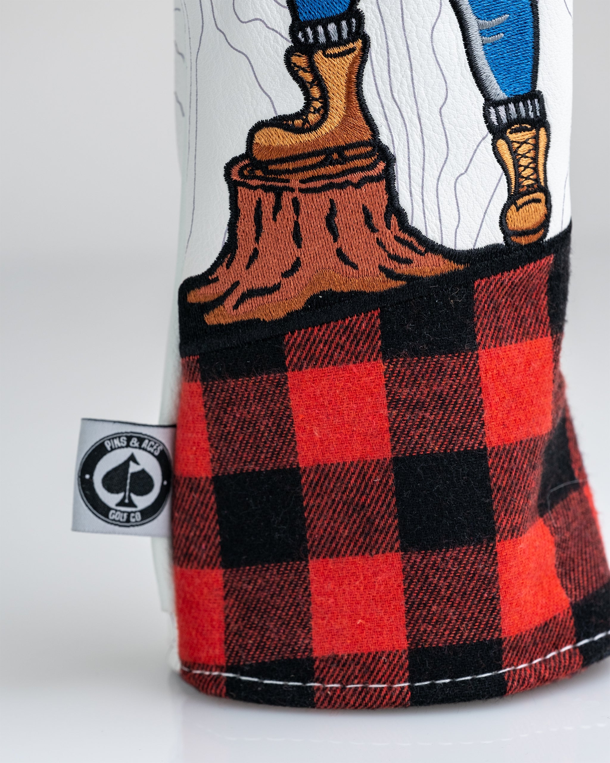 Hacker Fairway Cover showcasing a sleek, modern design with a bold logo on a black background, ideal for protecting golf clubs.