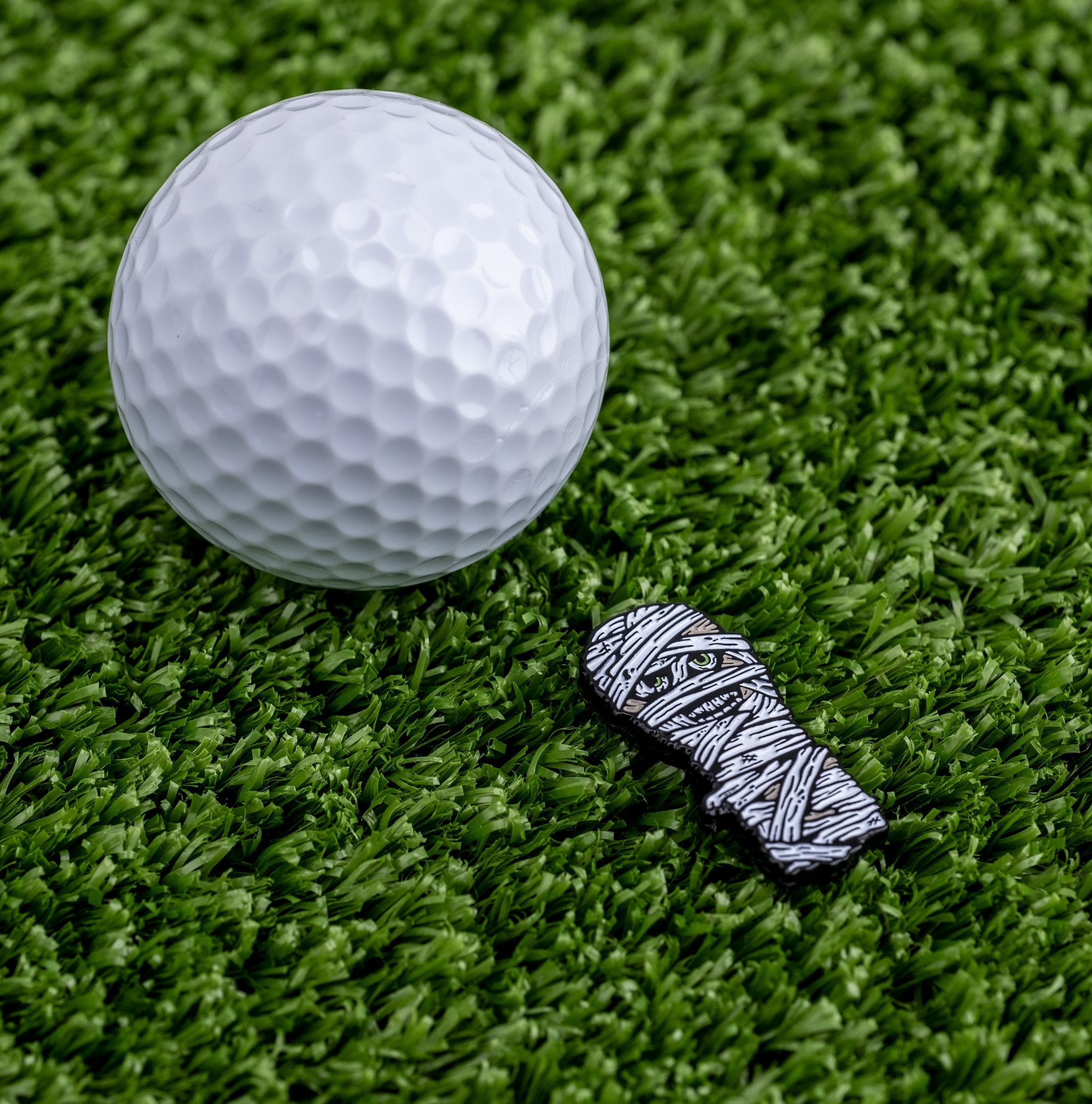 Mummy Ball Marker featuring a cartoon-style mummy design, ideal for Halloween-themed golf accessories.