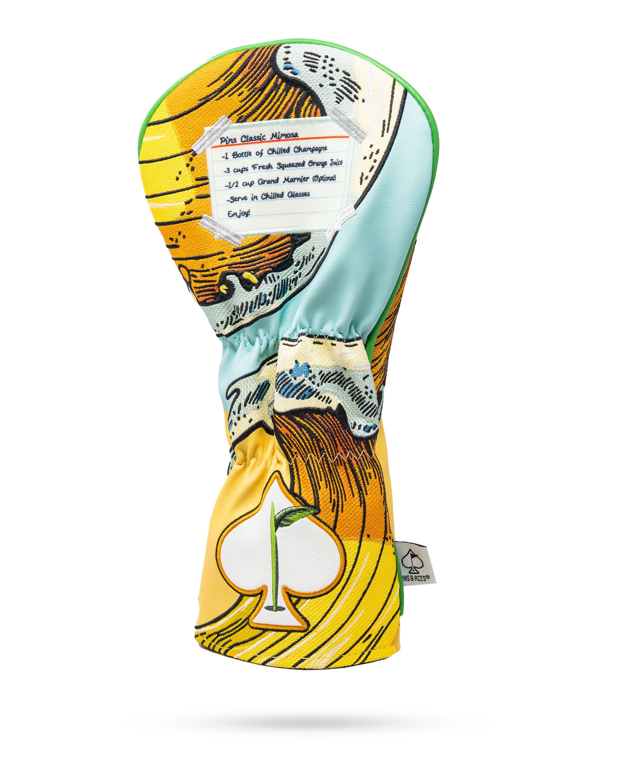 Mimosa driver cover featuring a vibrant orange and yellow design with a champagne glass and fruit graphics.