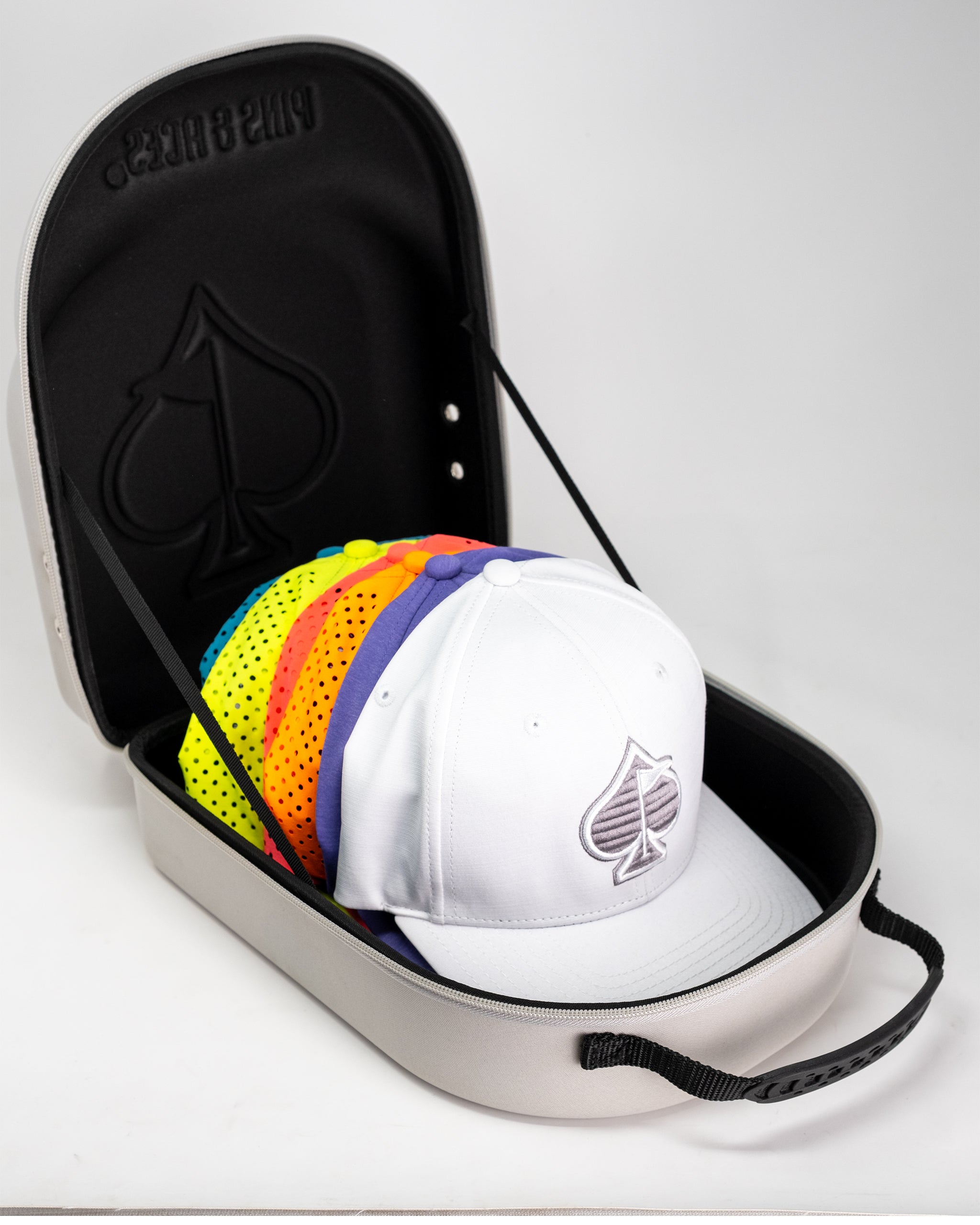 Hat Caddie - Stone color hat organizer with multiple slots for storing and displaying hats.
