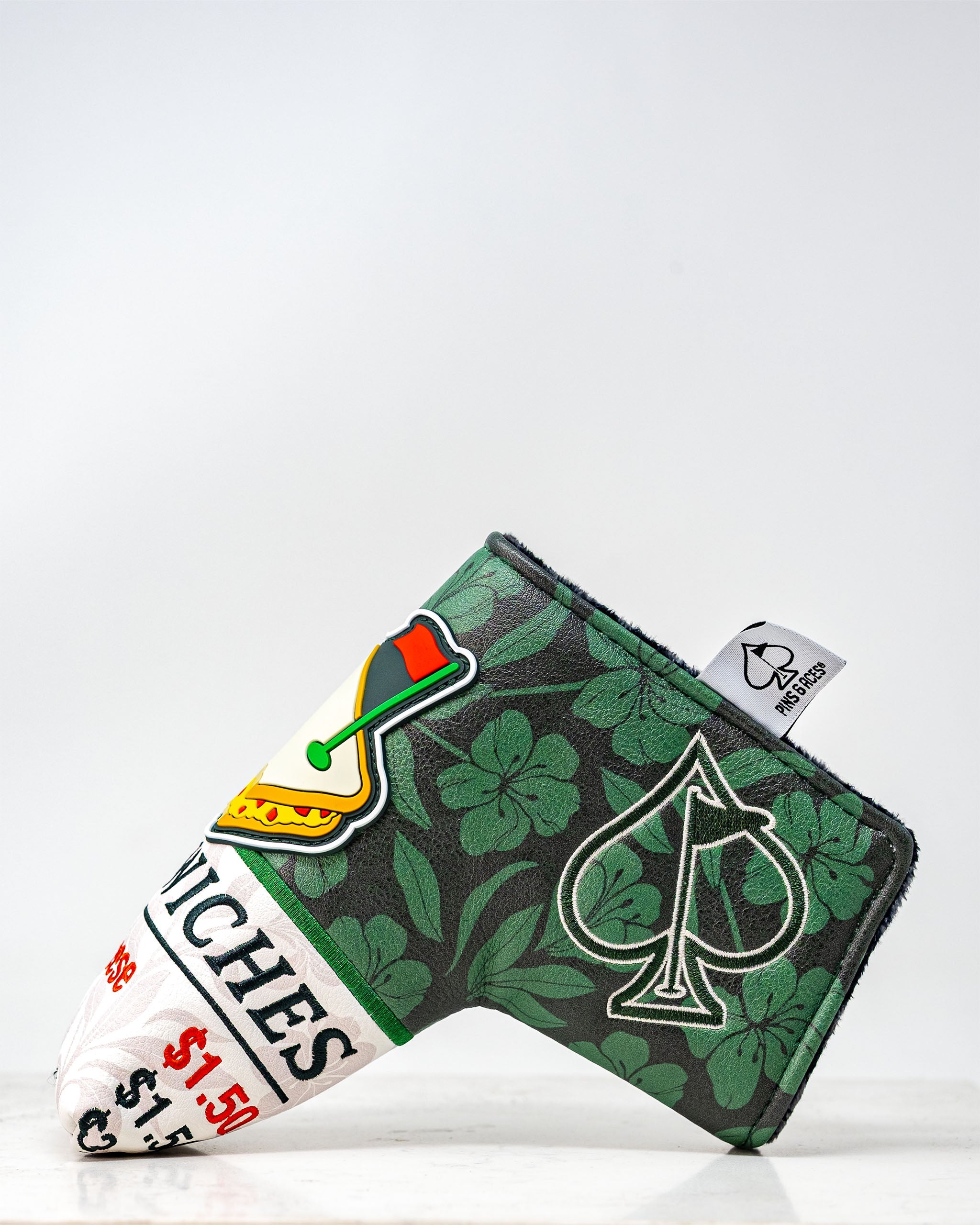 Augusta '25 Blade Putter Cover featuring a vibrant green fabric with embroidered details, designed for stylish club protection.